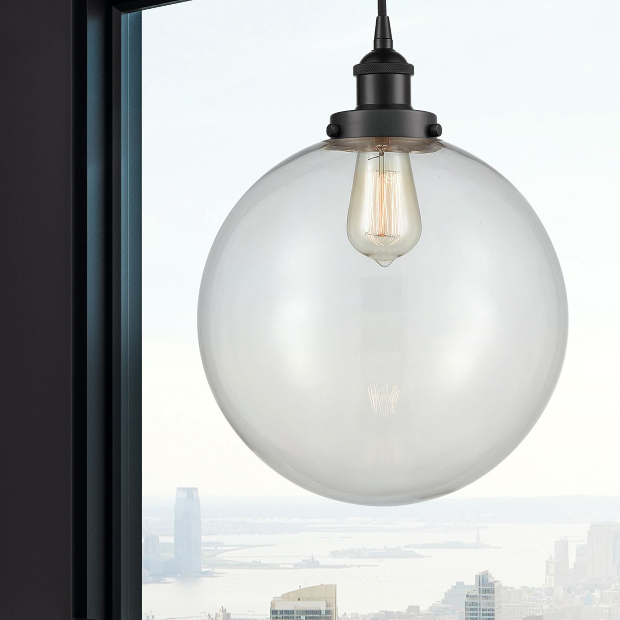 Shown in Matte Black finish and Clear Beacon glass