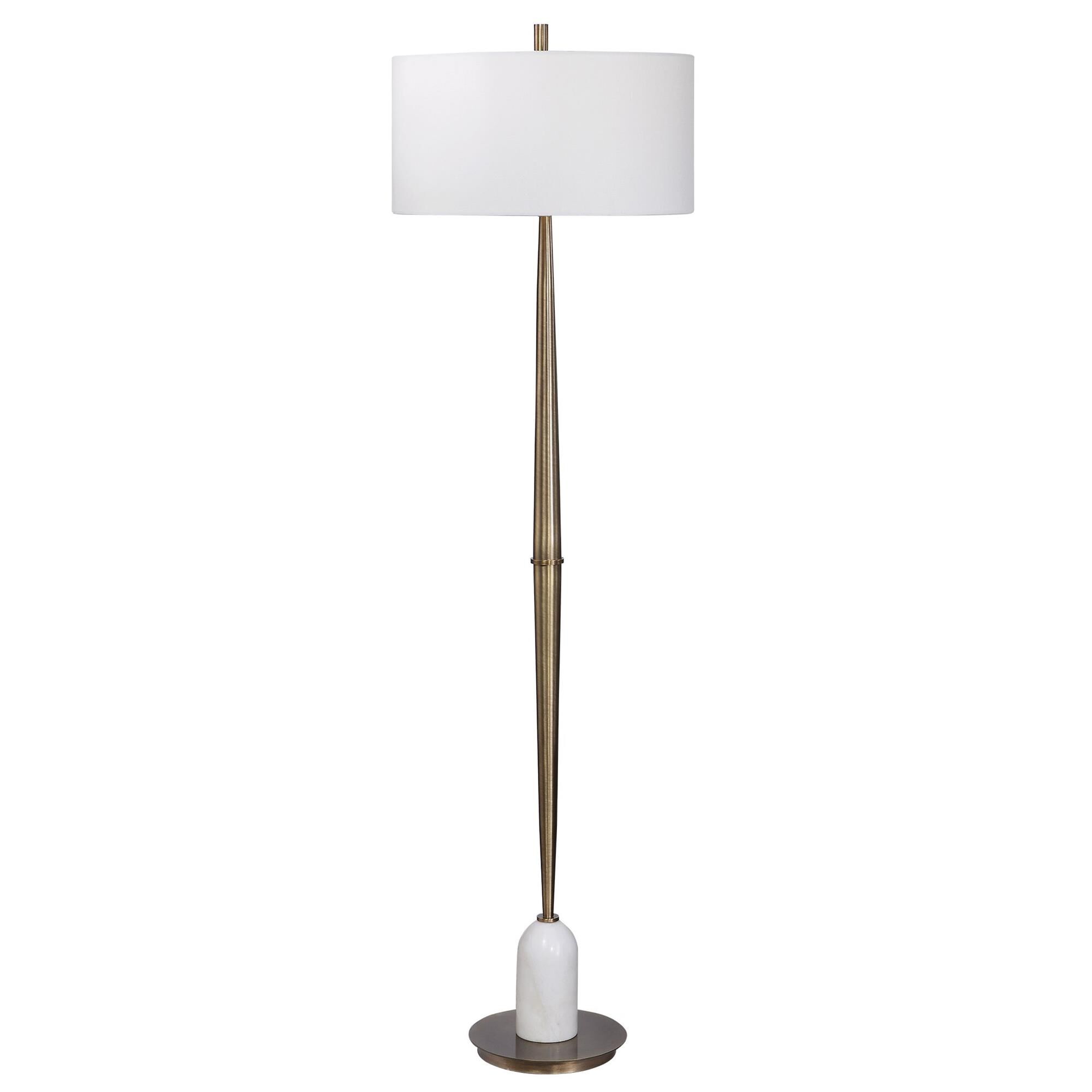 Shown in Transitional In Design, This Floor Lamp Has A Tapered Base Finished In A Plated Antique Brass, Accen finish and Round Drum Hardback shade