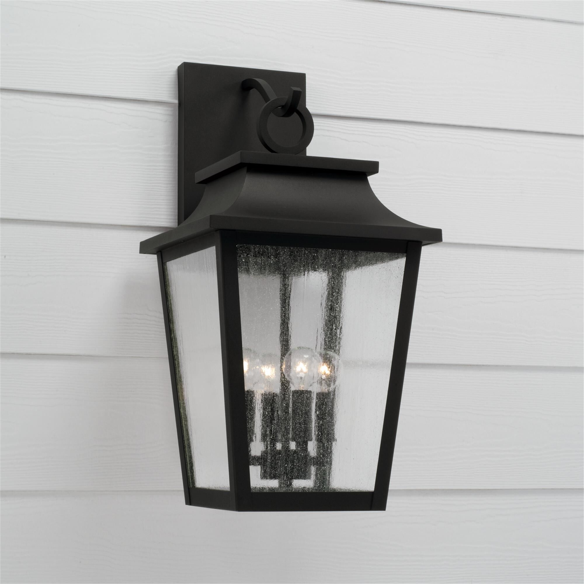 Shown in Black finish and Antiqued glass