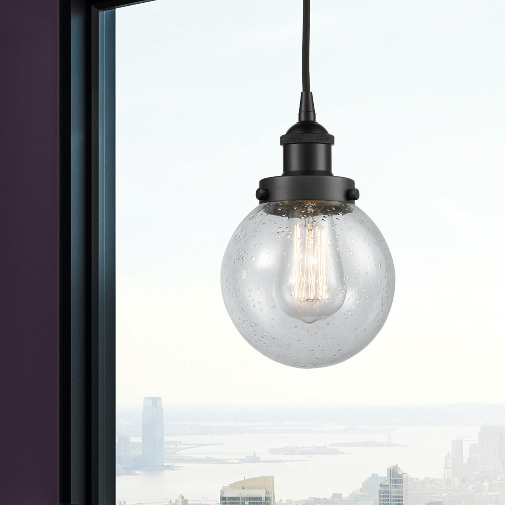 Shown in Matte Black finish and Seedy glass