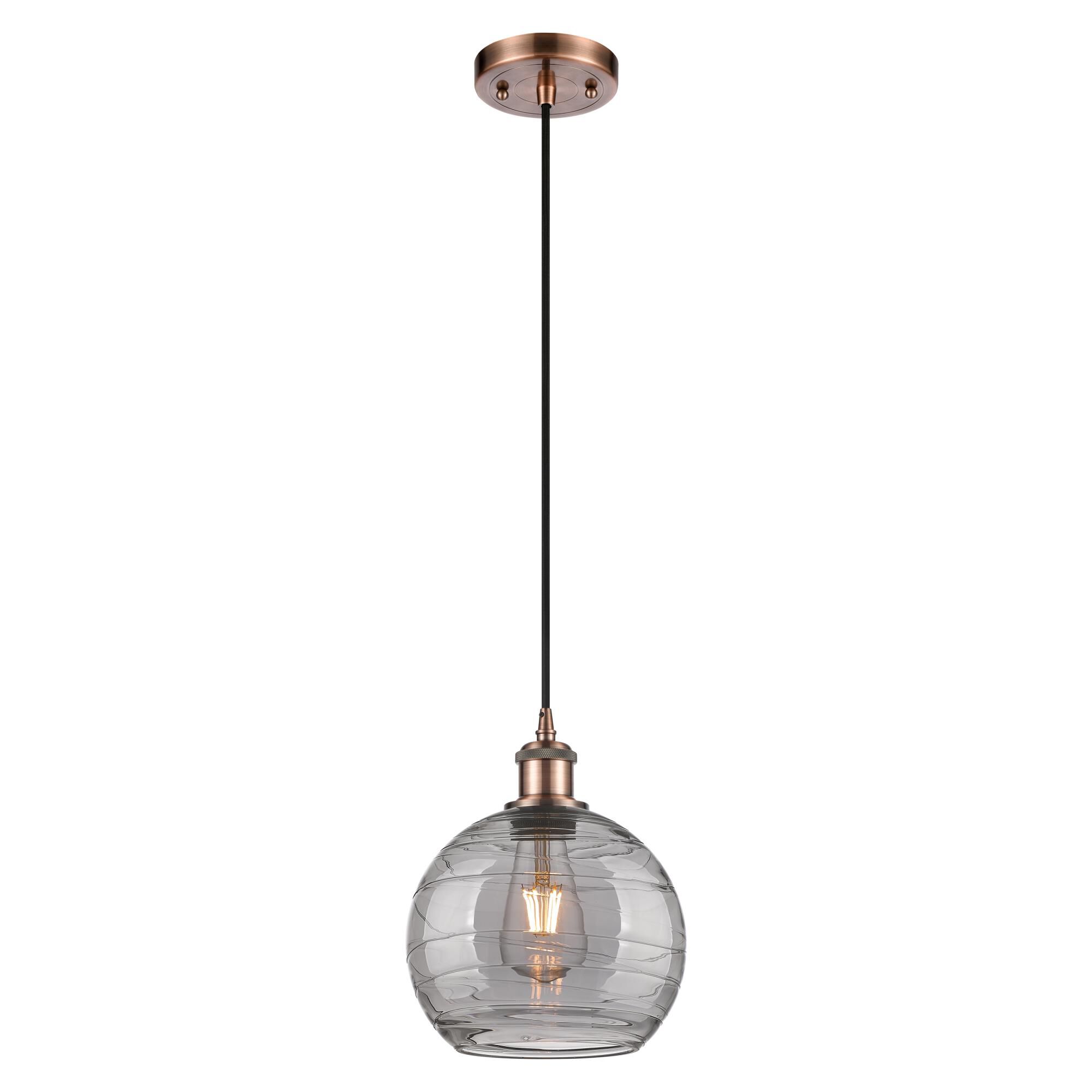 Shown in Antique Copper finish and Light Smoke Deco Swirl glass