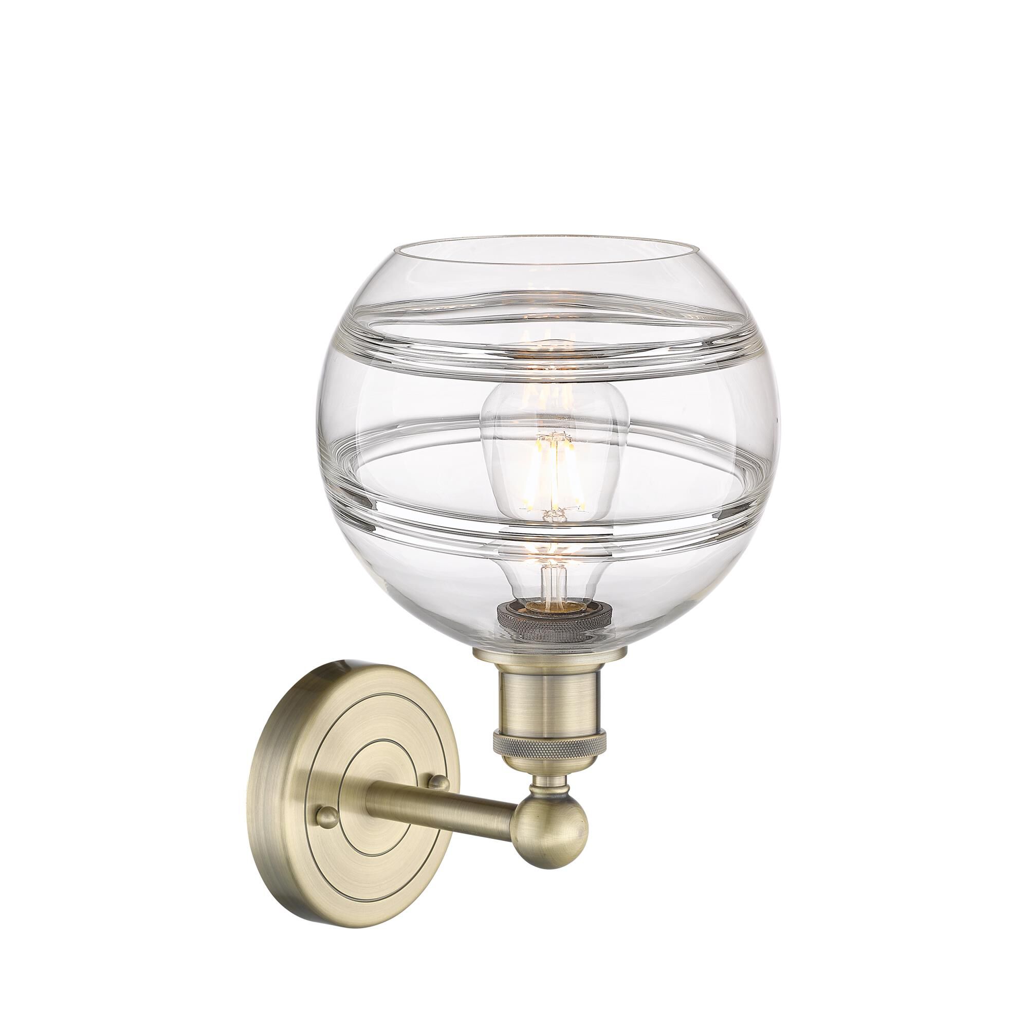 Shown in Antique Brass finish and Clear glass