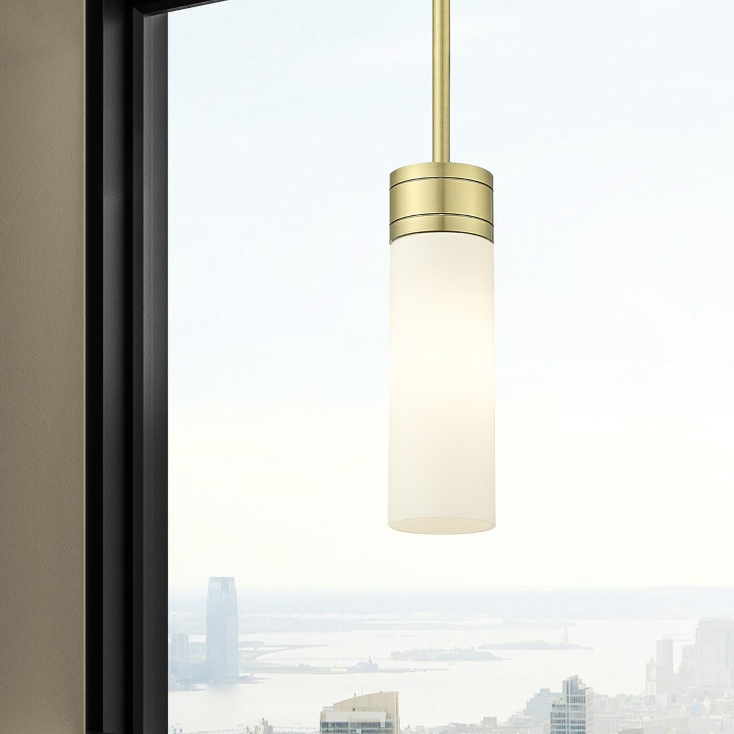 Shown in Antique Brass finish and White glass