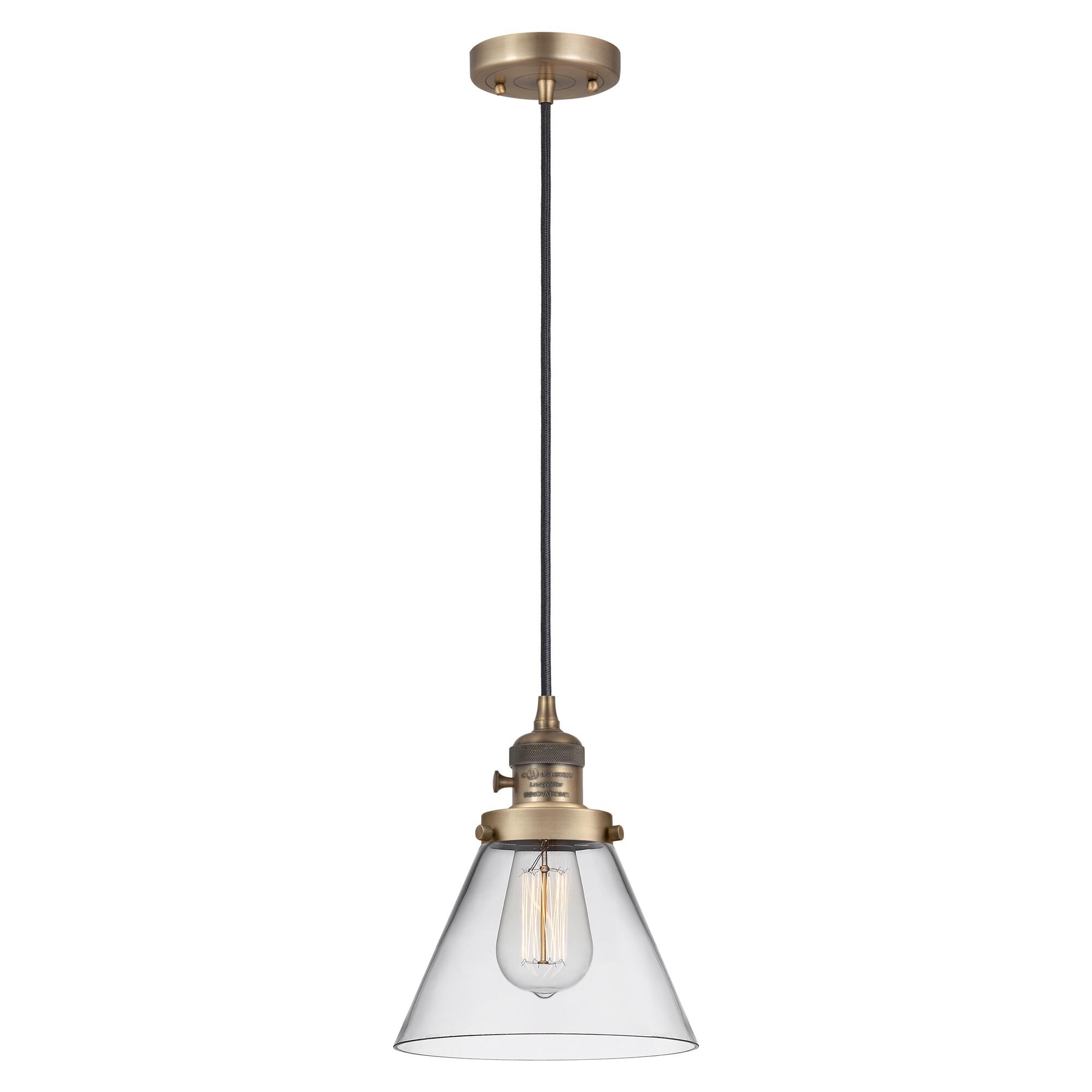 Shown in Brushed Brass finish and Clear glass