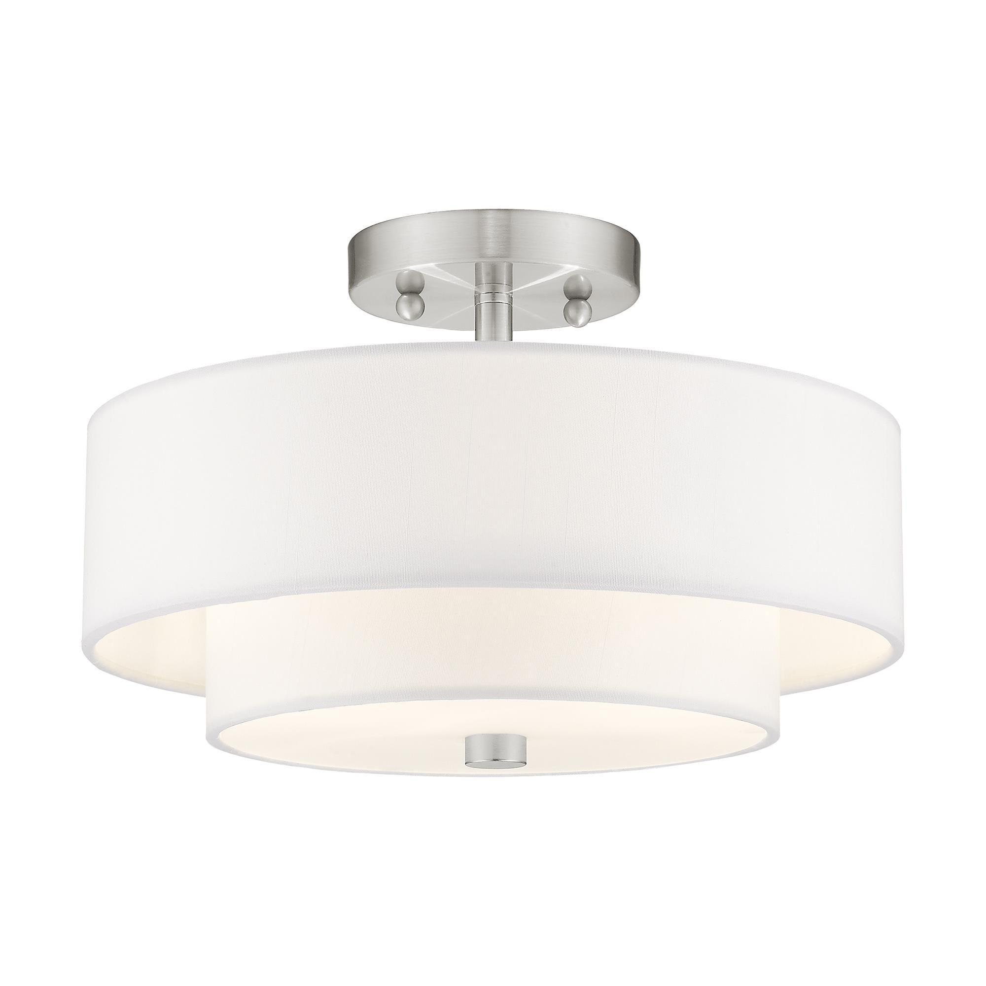 Shown in Brushed Nickel finish and Hand Crafted Off-White Fabric Hardback shade