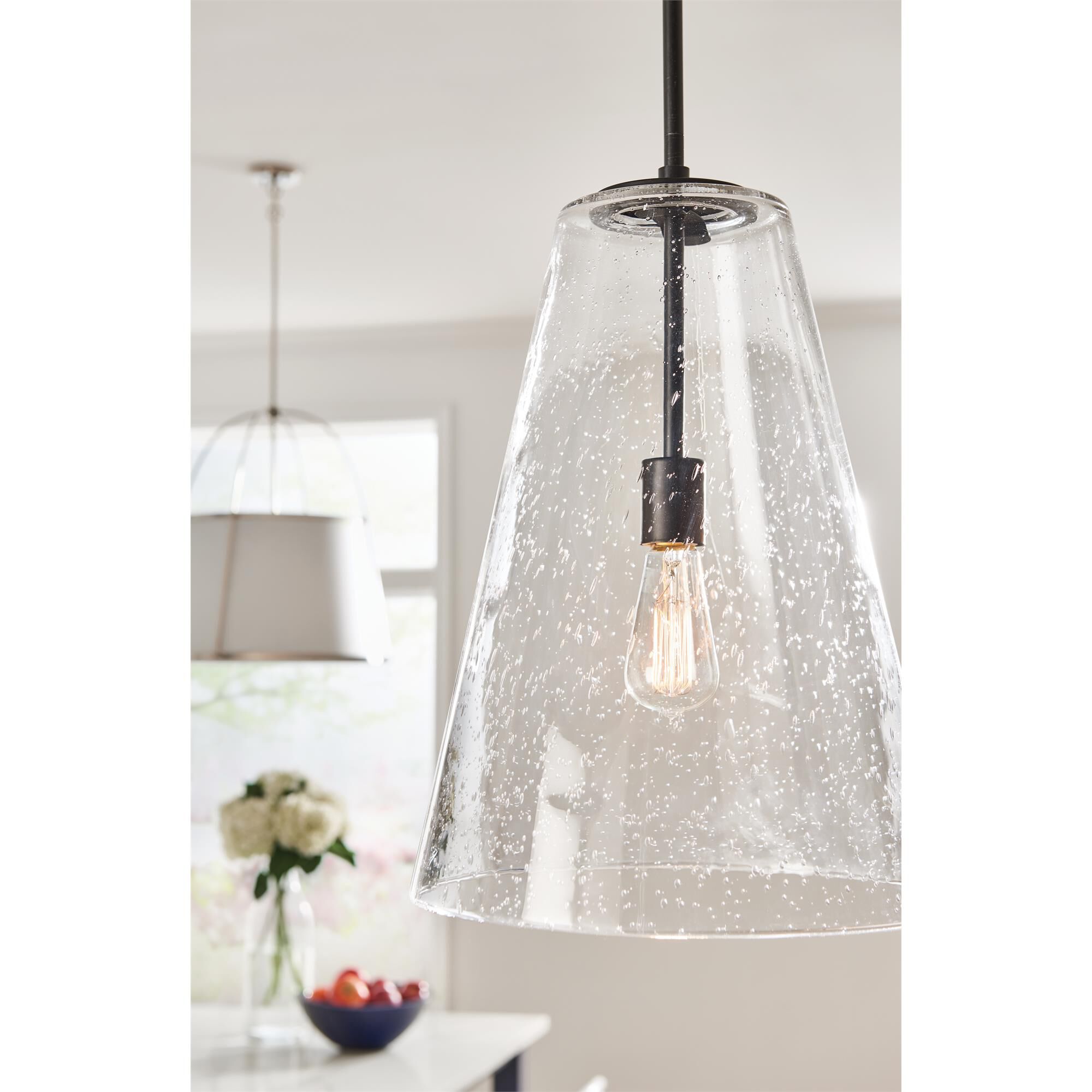 Shown in Heritage Brass finish and Clear Seedy glass