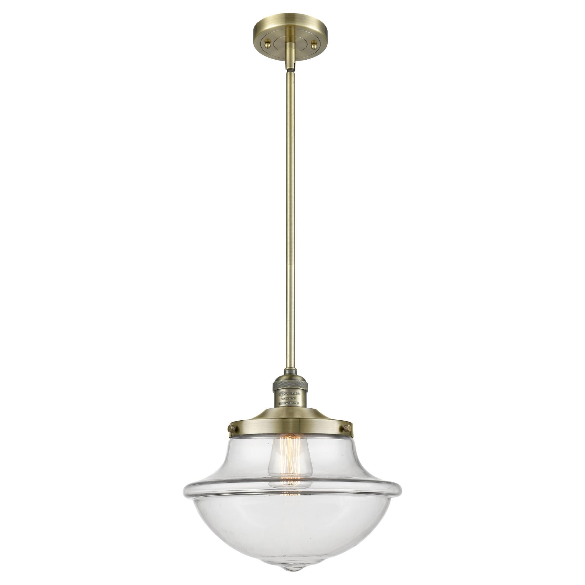 Shown in Antique Brass finish and Seedy glass