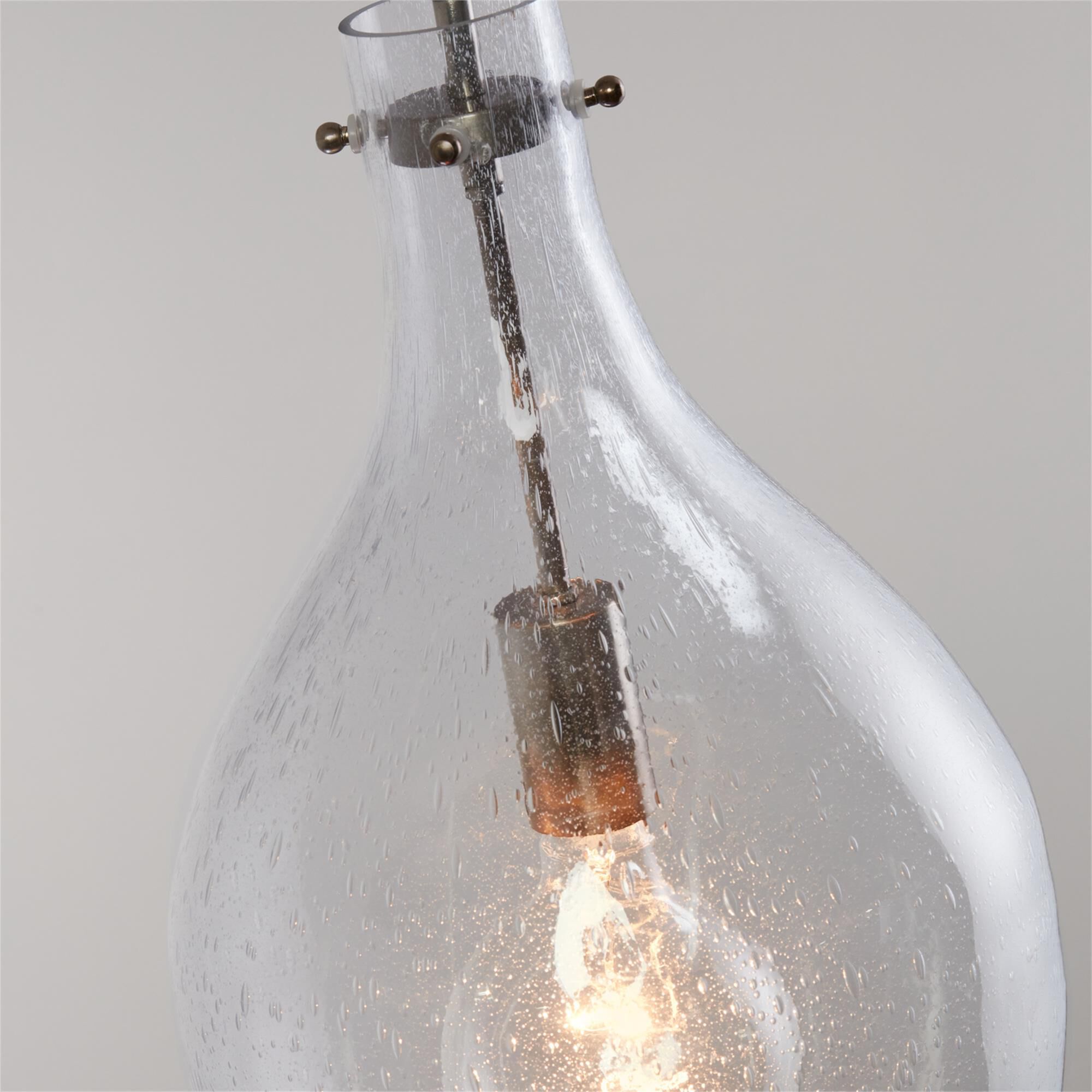 Shown in Polished Pewter finish and Clear Seeded glass