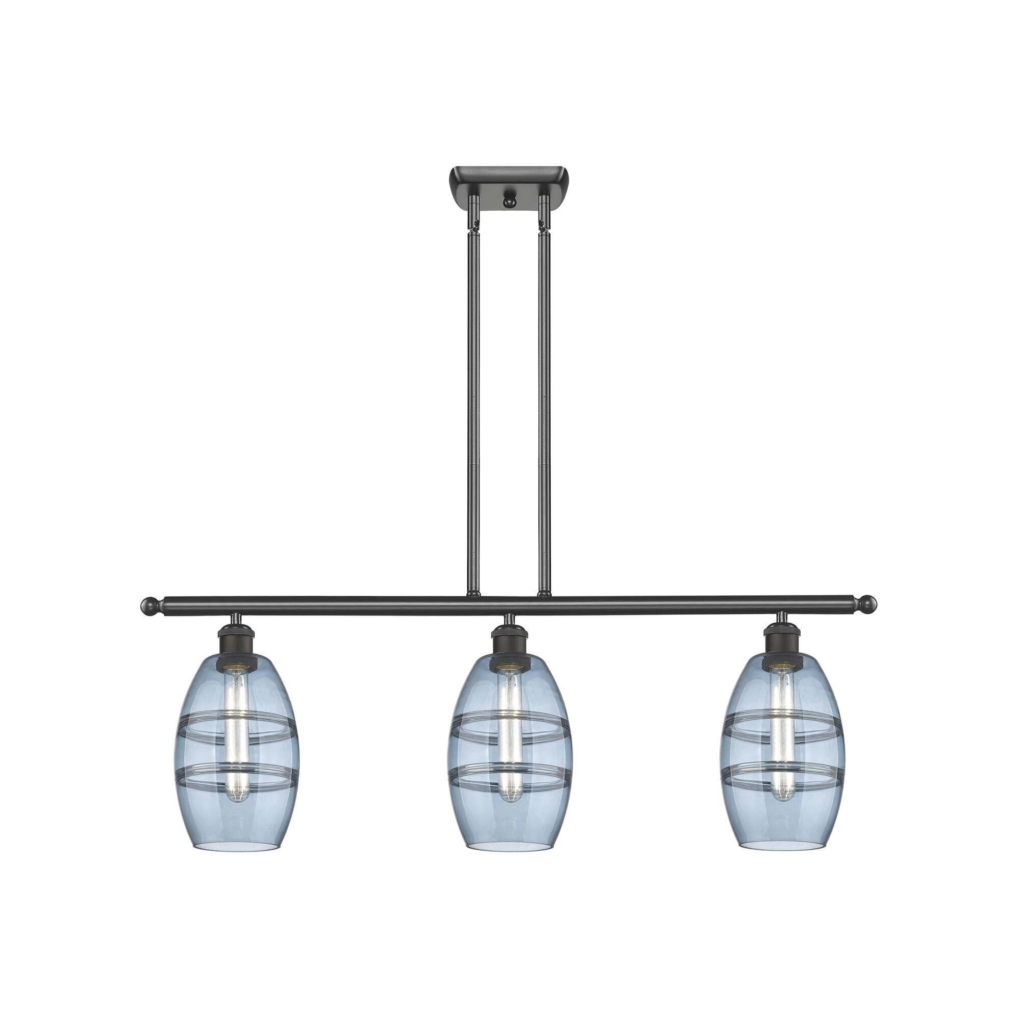 Shown in Oil Rubbed Bronze finish and Princess Blue glass