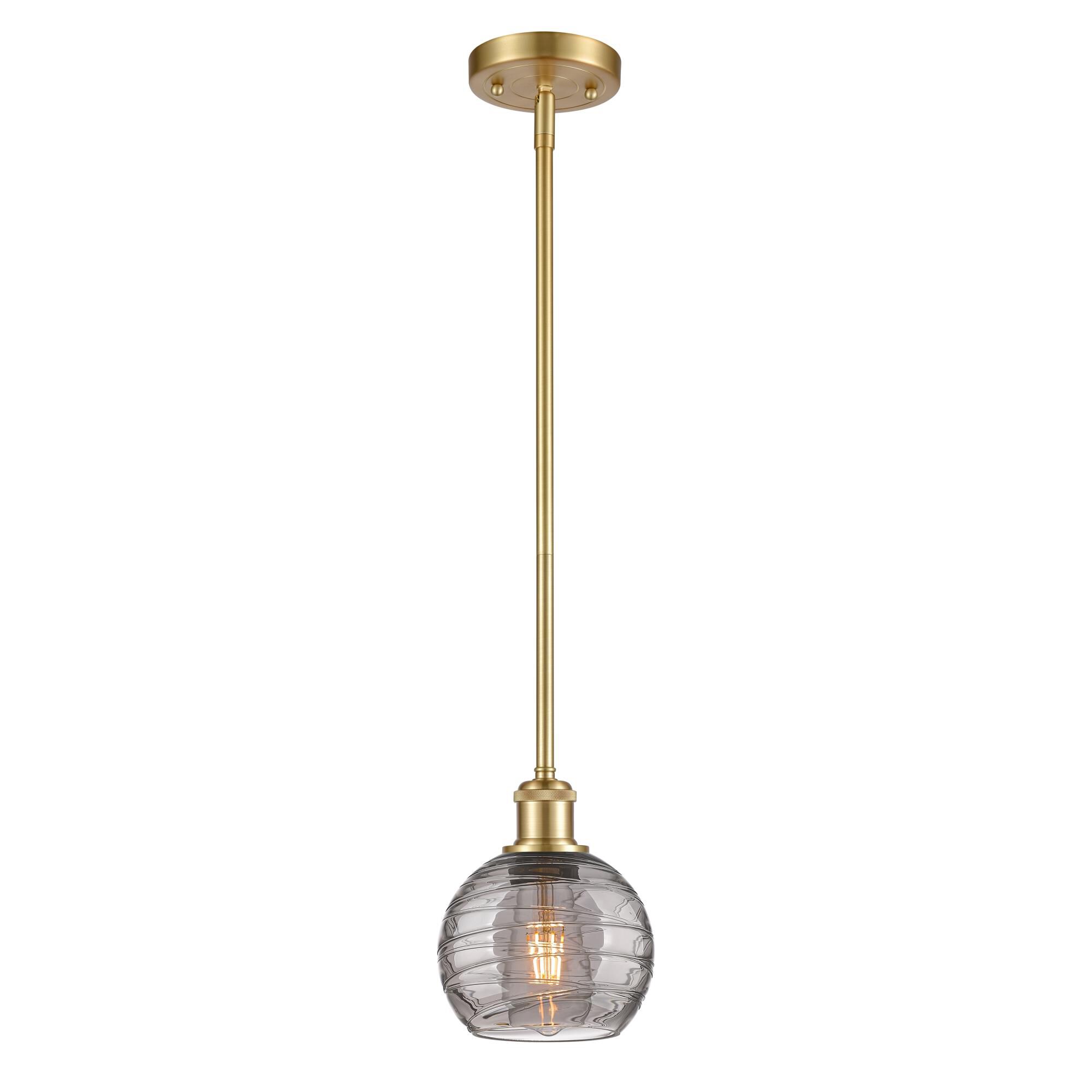 Shown in Satin Gold finish and Light Smoke Deco Swirl glass