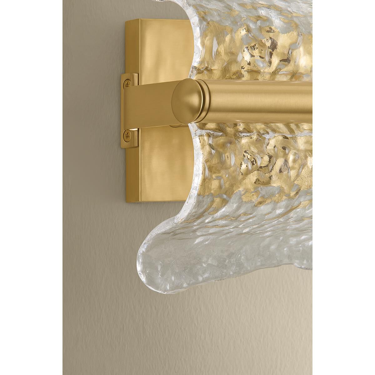 Shown in Aged Brass finish and Clear Optic glass