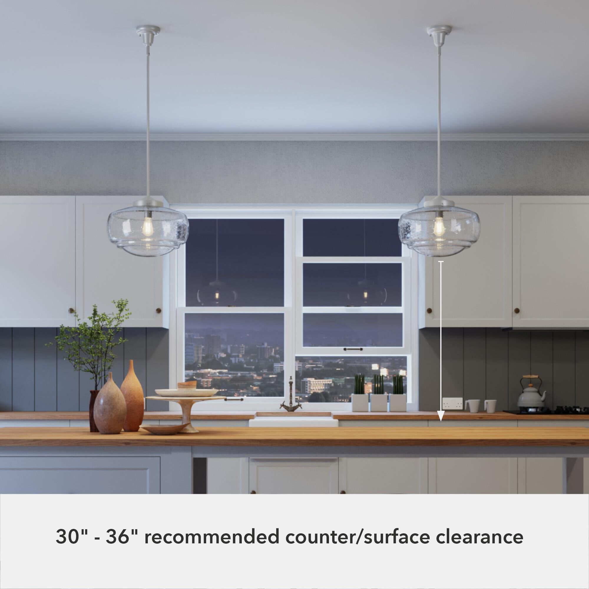 Shown in Brushed Nickel finish and Clear Seeded glass