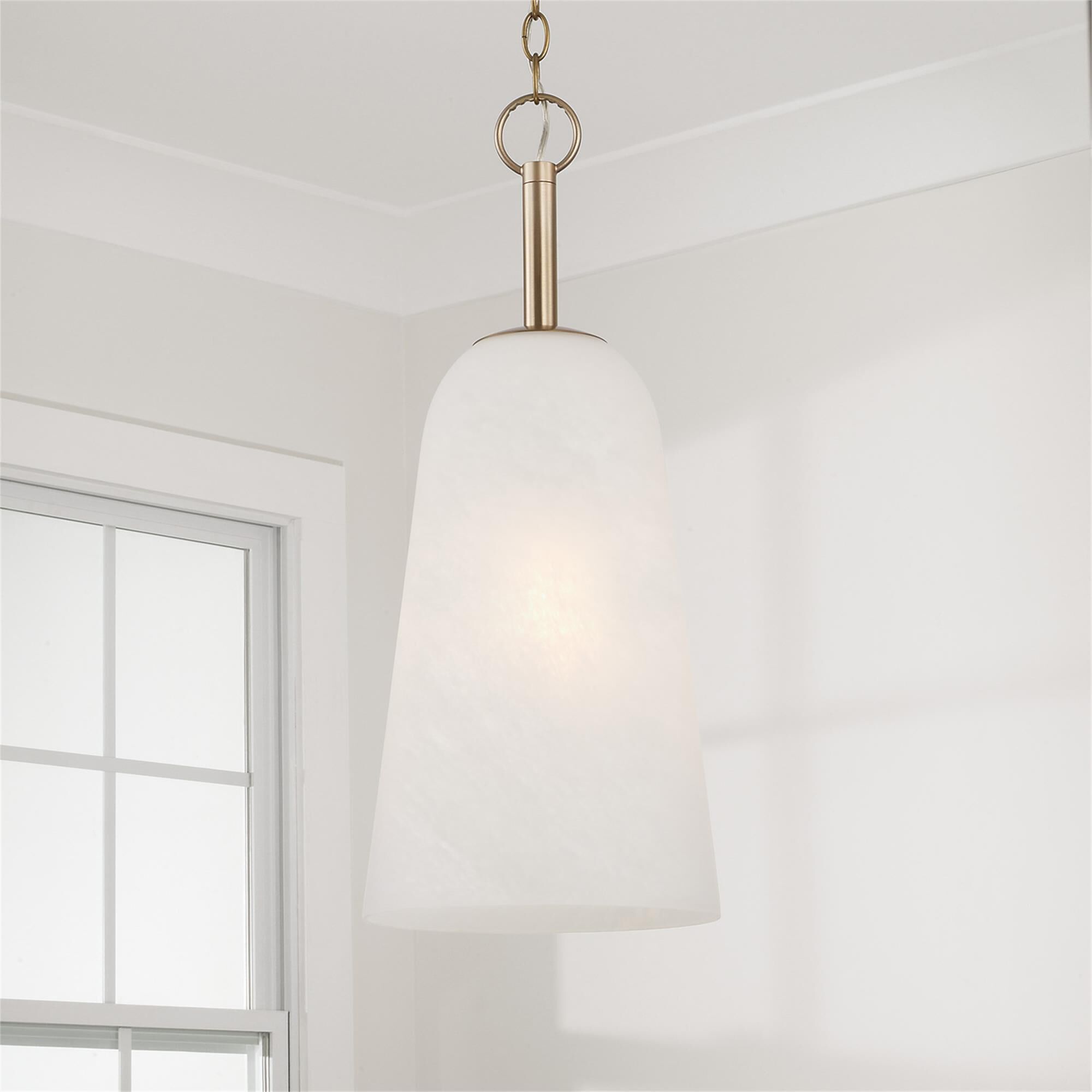 Shown in Matte Brass finish and Faux Alabaster glass