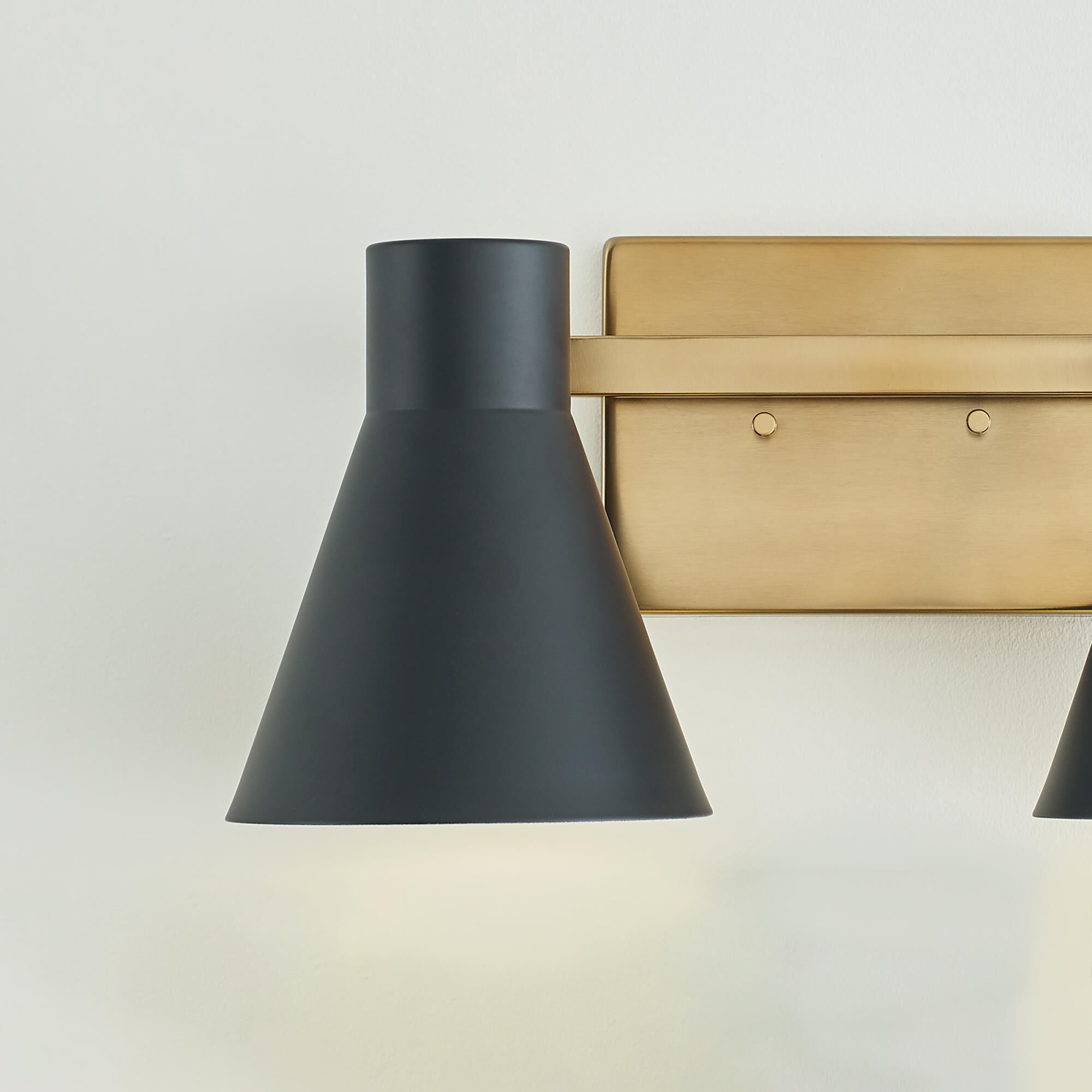 Shown in Satin Brass finish and Black Steel shade