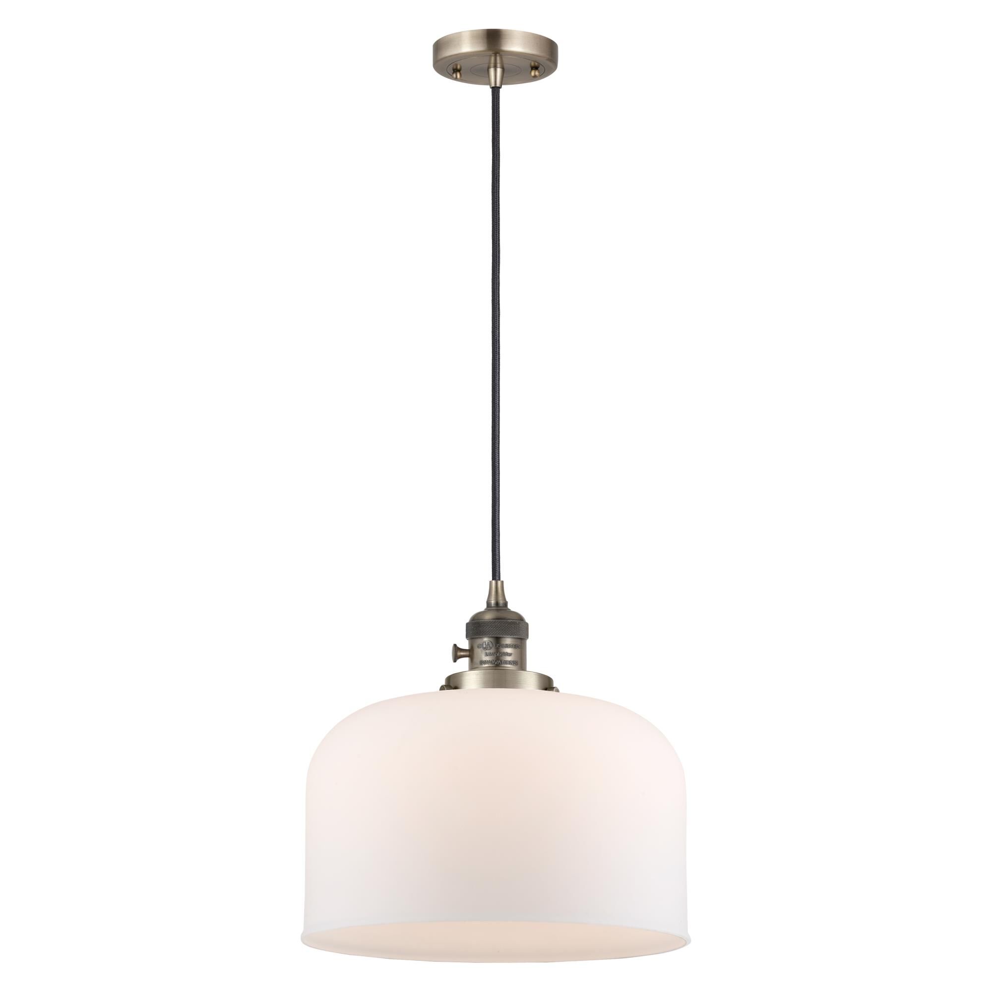 Shown in Antique Brass finish and Matte White Cased glass