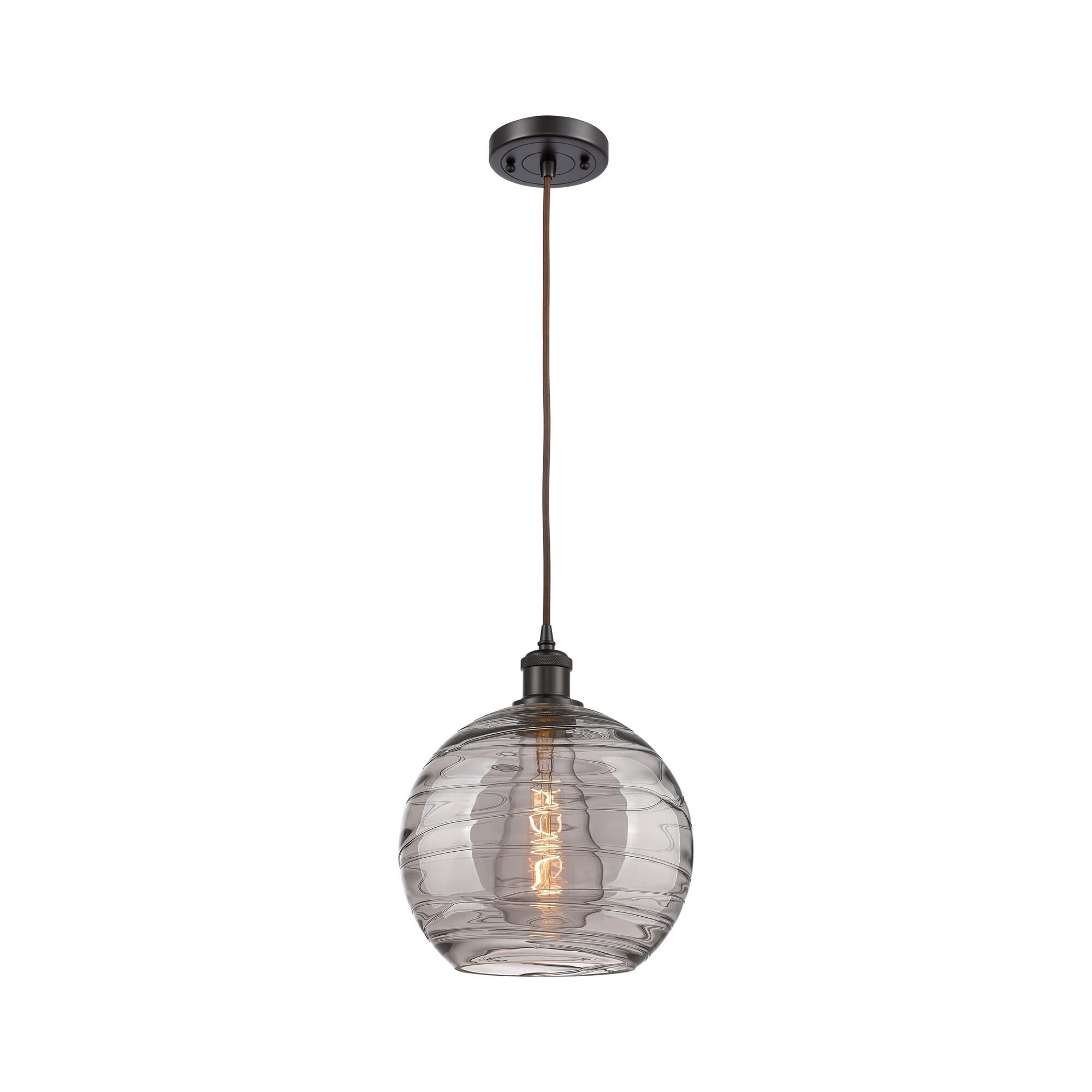 Shown in Oil Rubbed Bronze finish and Light Smoke Deco Swirl glass