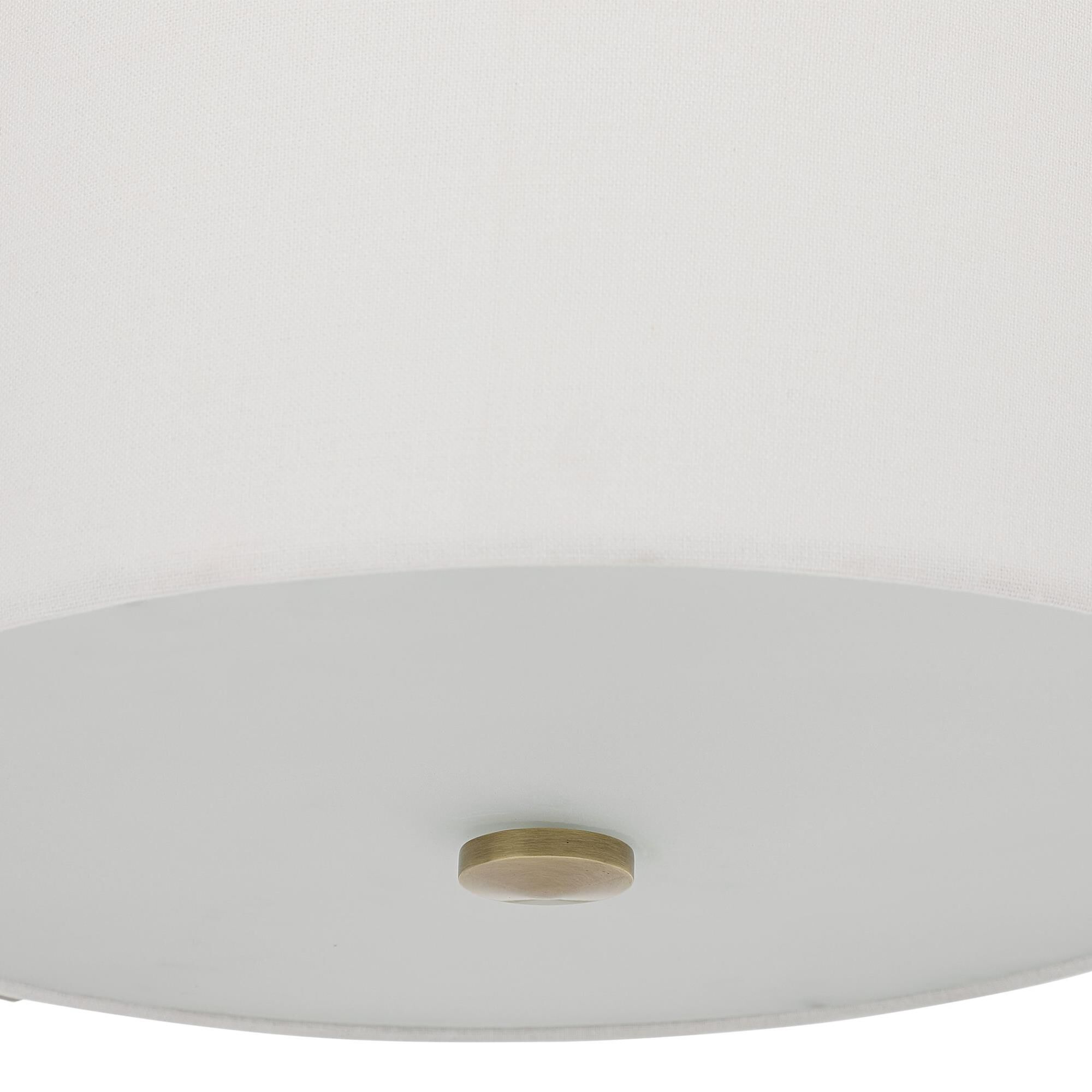 Shown in Antique Brass finish and Frosted Diffuser glass and Off White Linen shade