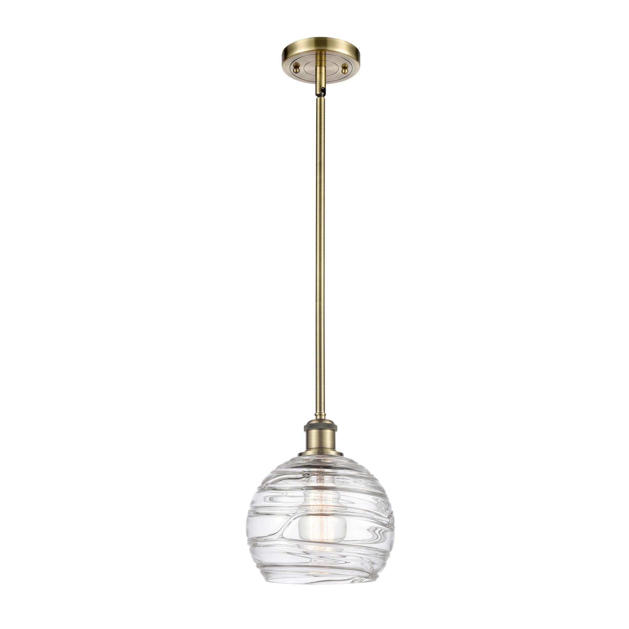 Shown in Antique Brass finish and Sphere glass and Glass shade