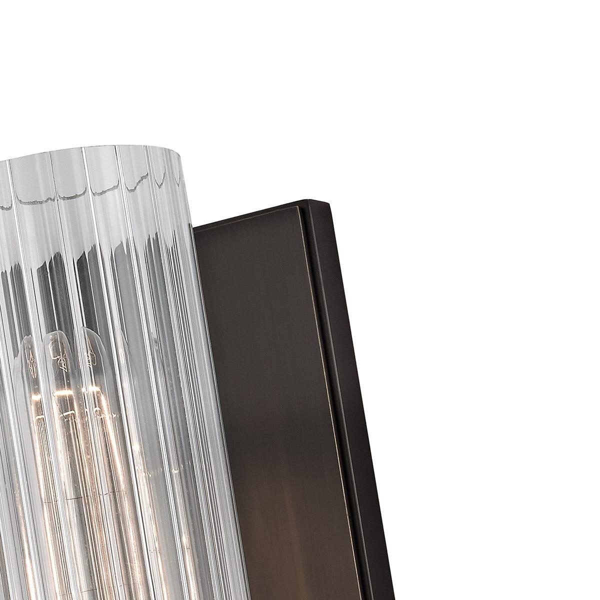 Shown in Old Bronze finish and Clear Ribbed glass