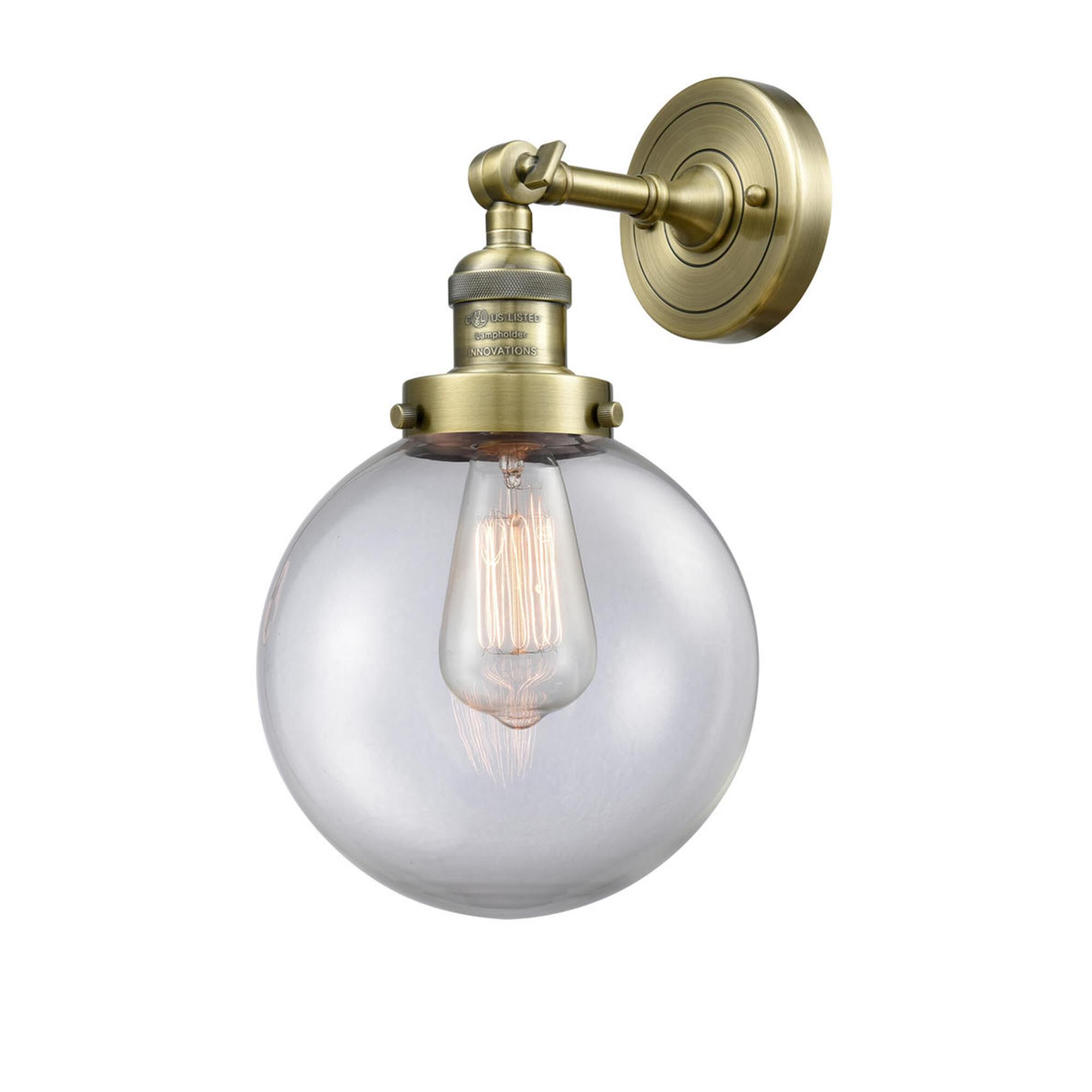 Shown in Antique Brass finish and Clear glass and No Accent accent
