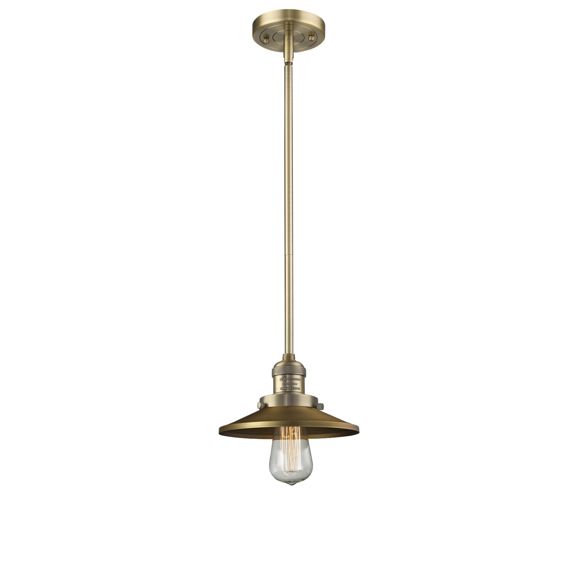 Shown in Brushed Brass finish and Brushed Brass shade