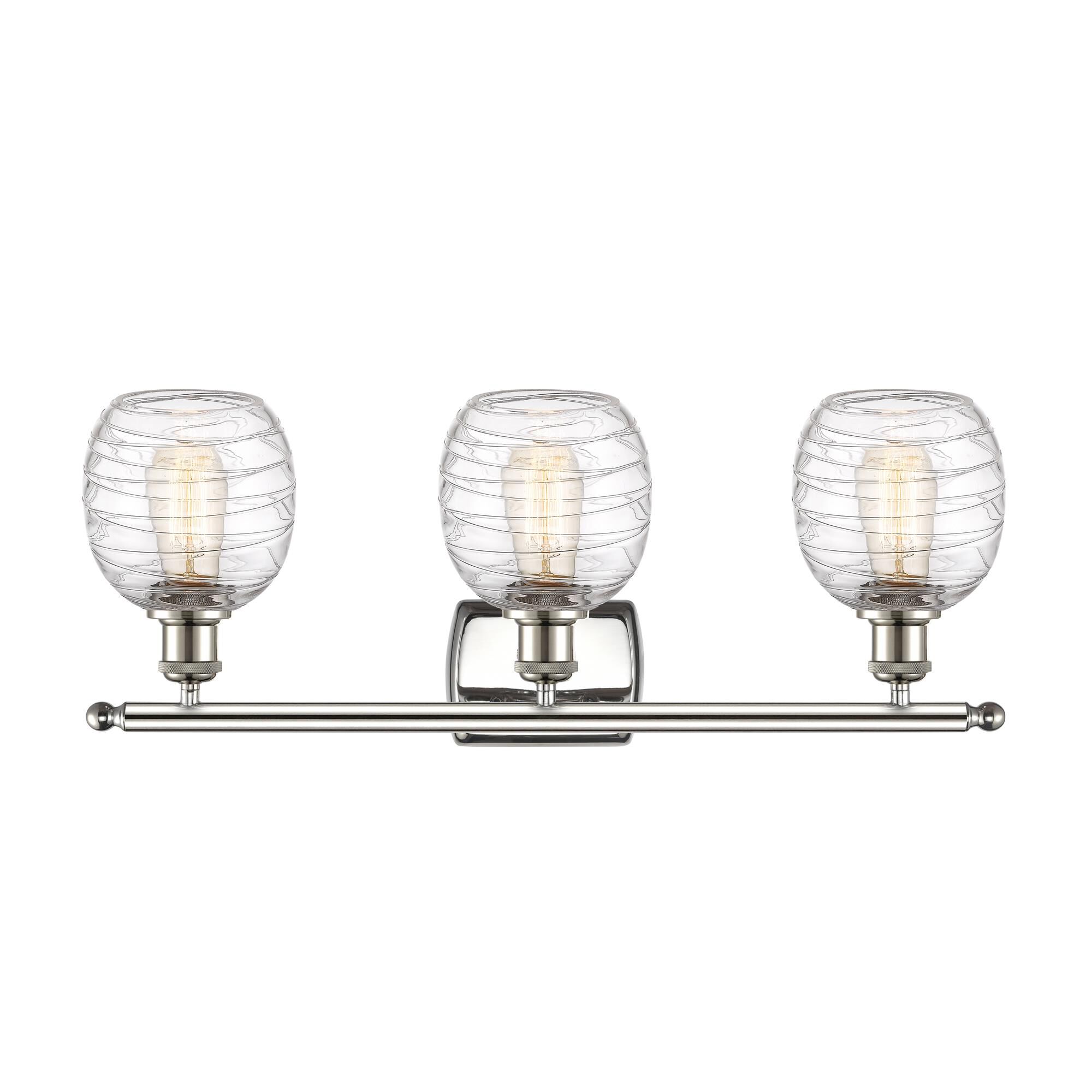Shown in Polished Nickel finish and Deco Swirl glass