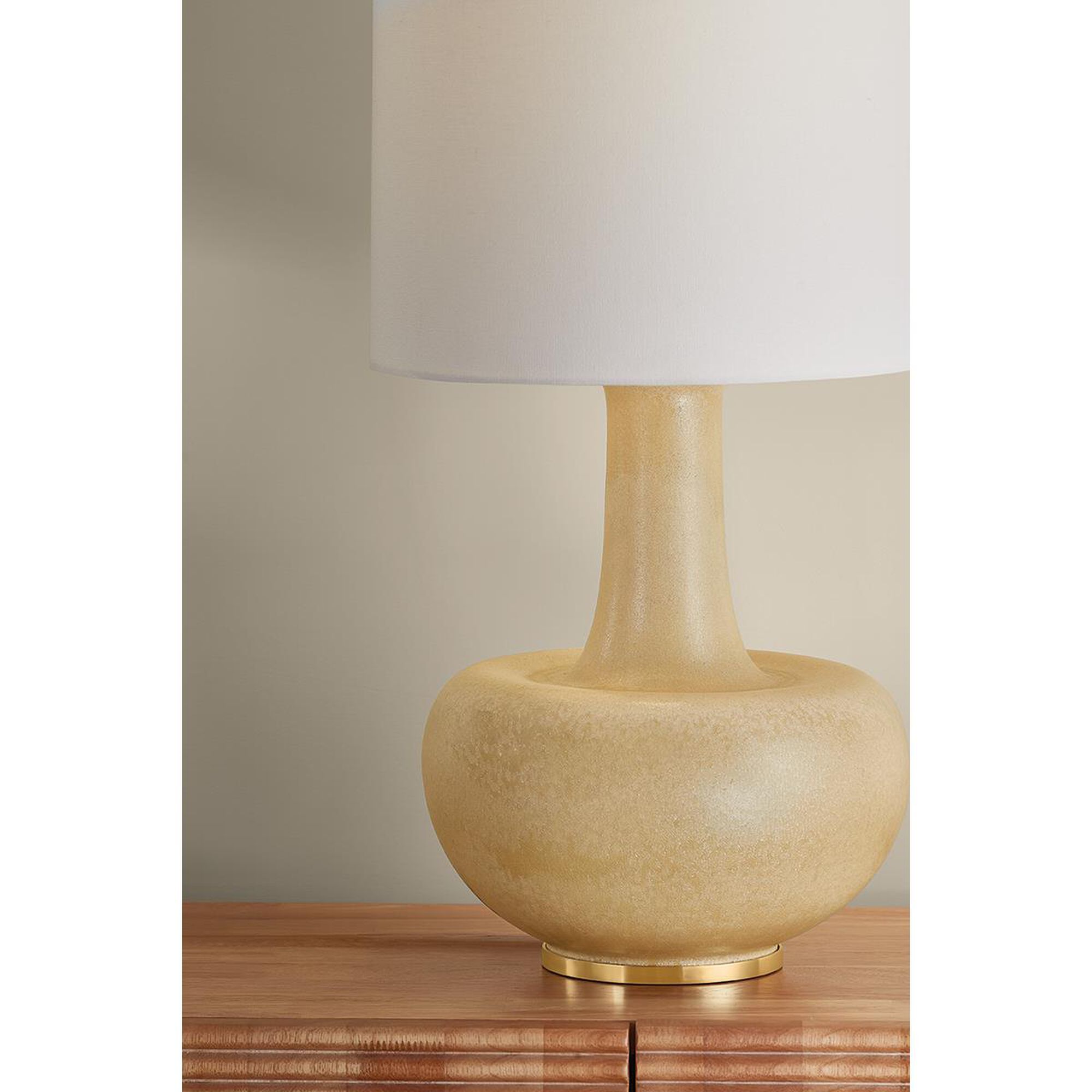 Shown in Aged Brass and Ceramic Biscotti Reactive finish and Textured Linen shade