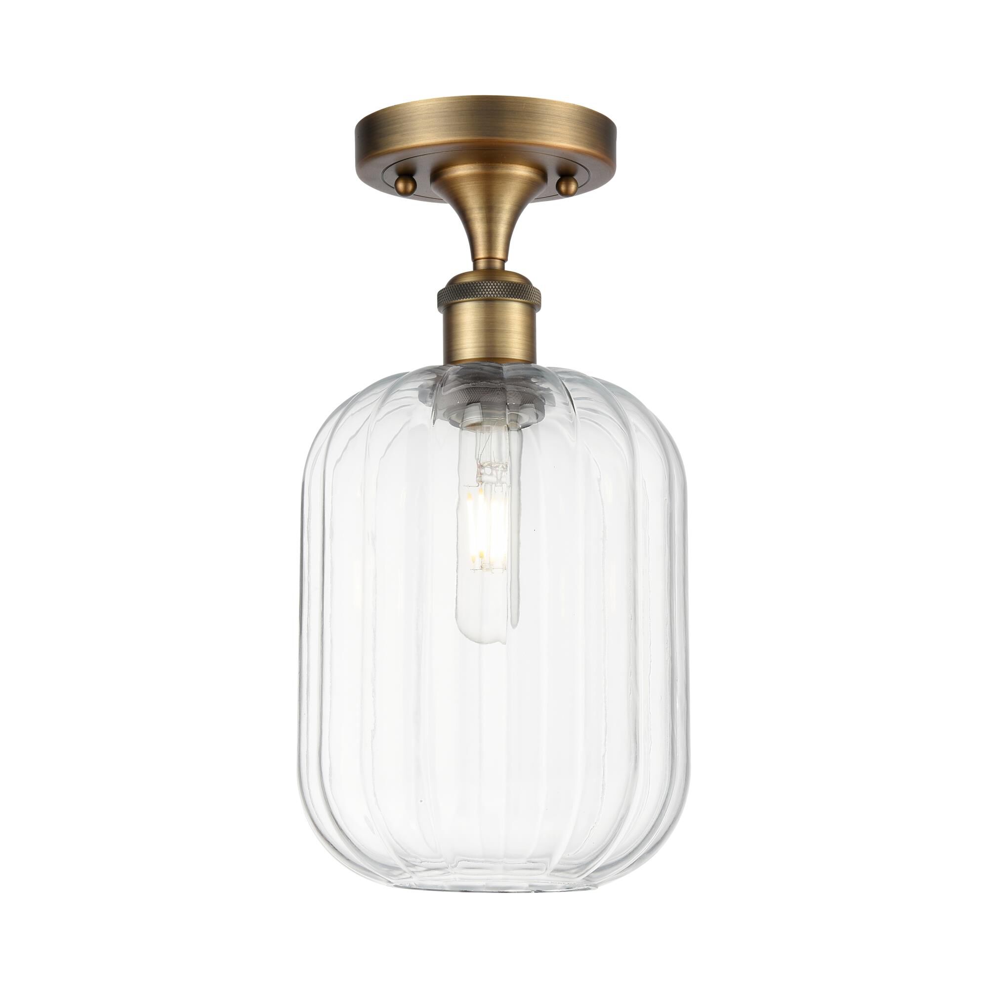 Shown in Brushed Brass finish and Clear glass