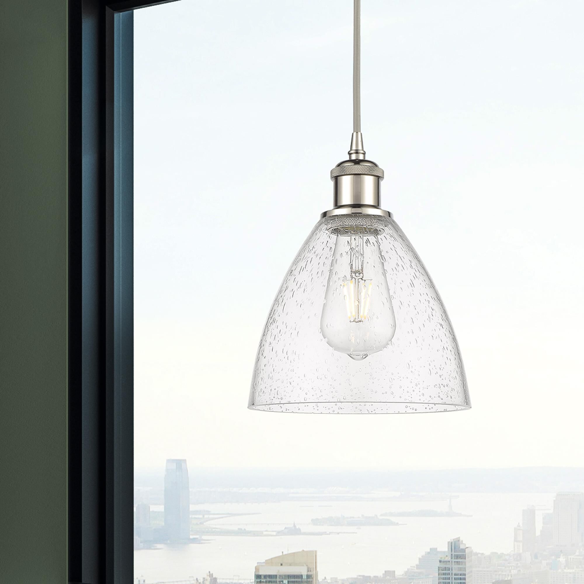 Shown in Polished Nickel finish and Seedy glass