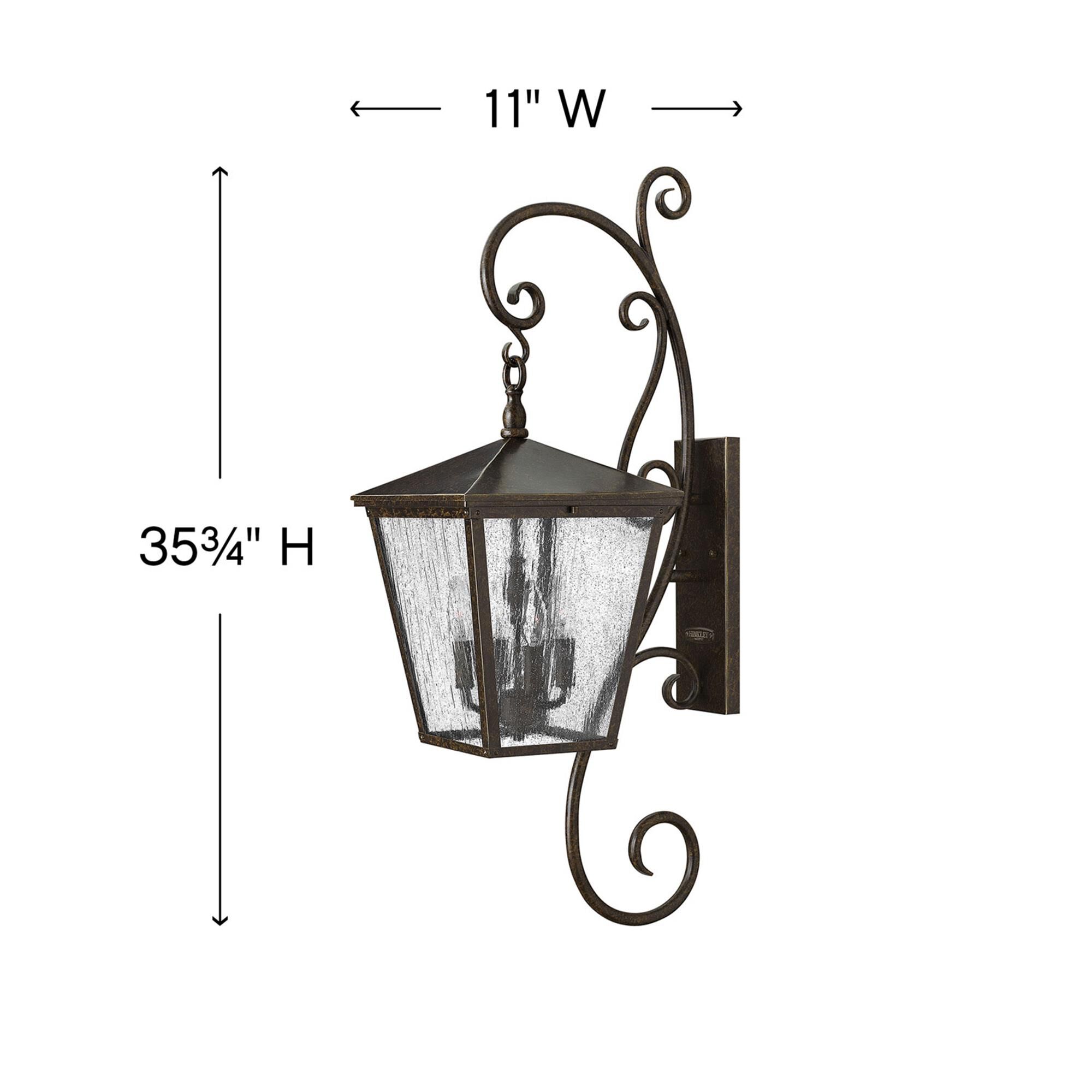Shown in Regency Bronze finish and Clear Seedy glass