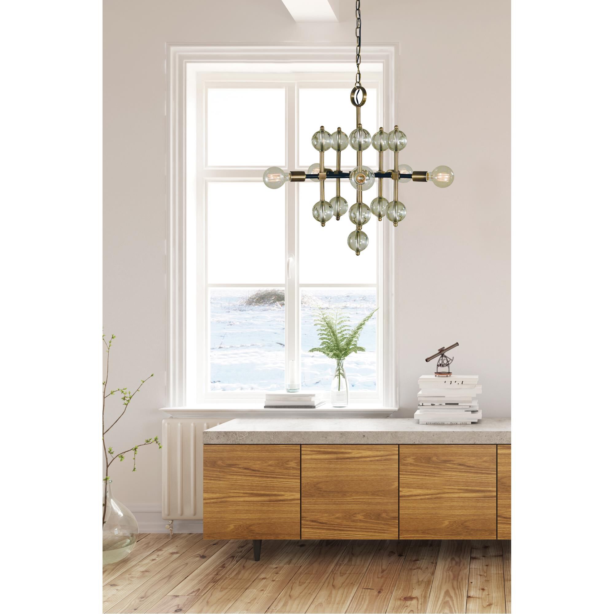 Shown in Antique Brass with Matte Black finish and Clear glass