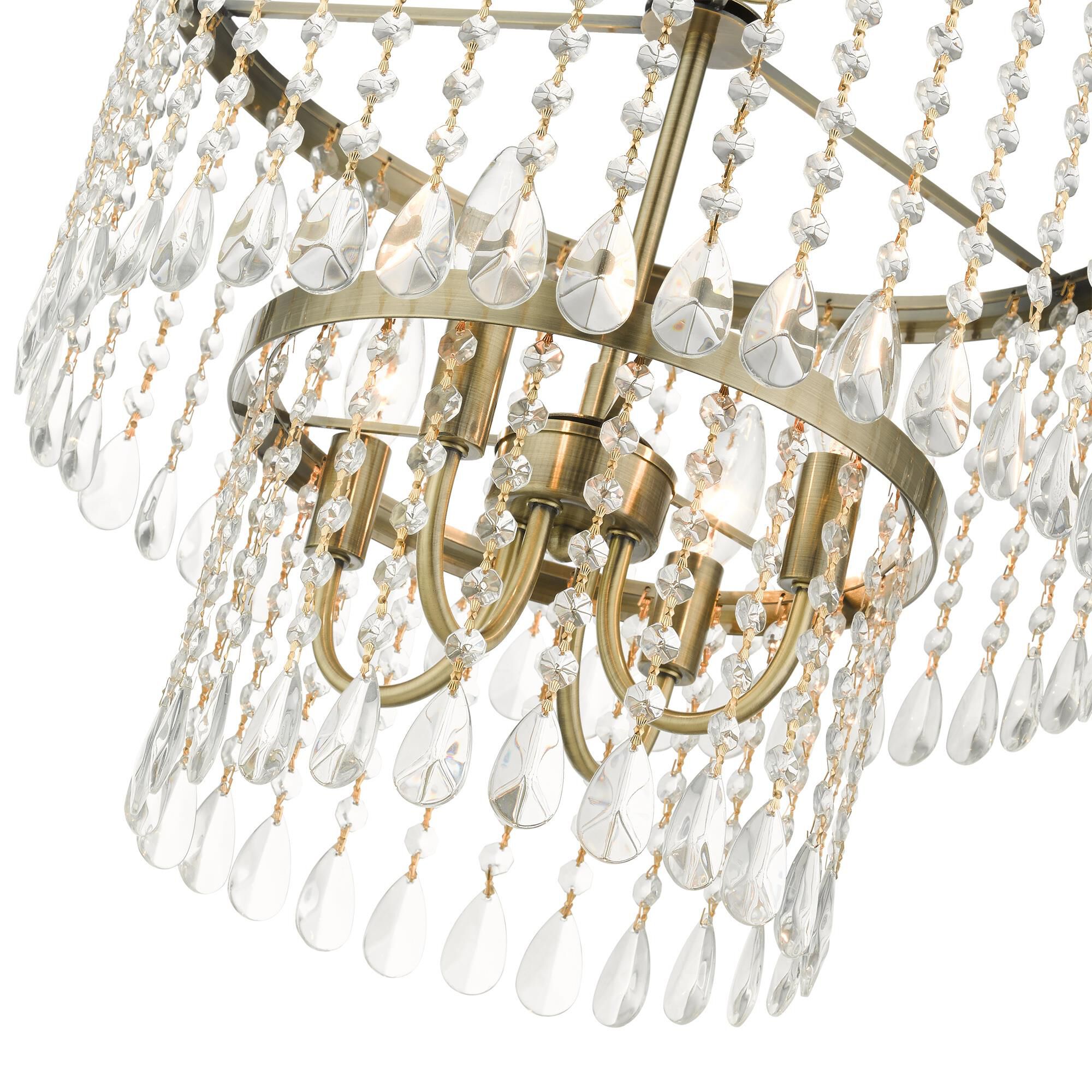 Shown in Antique Brass finish and Hand Assembled Crystal Shade glass