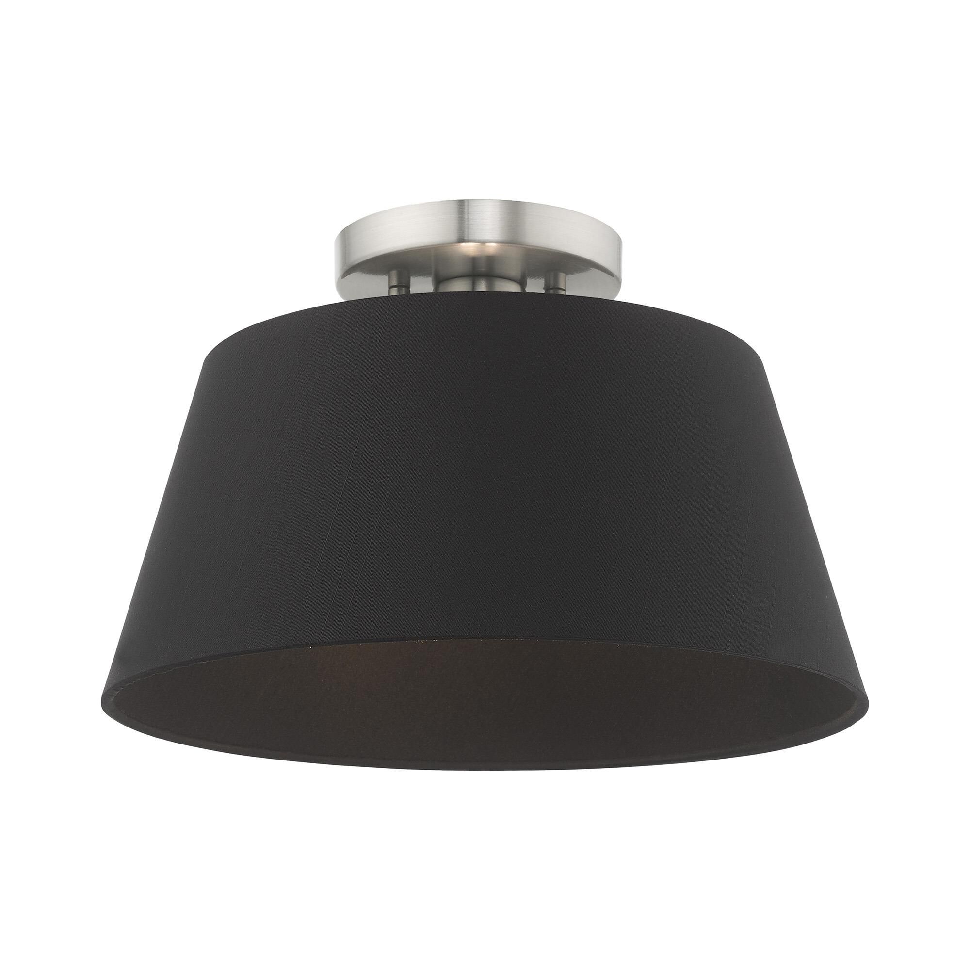 Shown in Brushed Nickel finish and Hand Crafted Black Fabric Hardback shade
