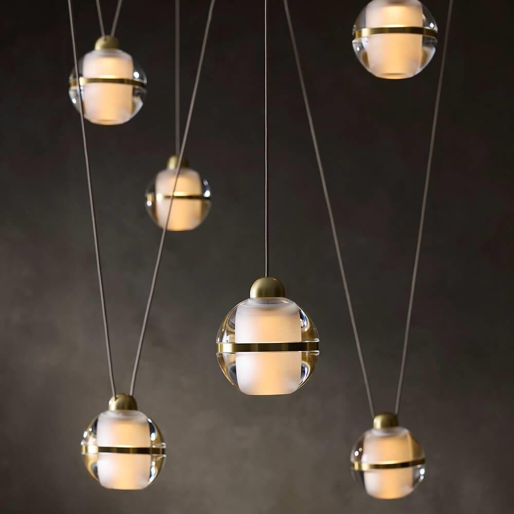 Shown in Antique Brass finish and Clear glass