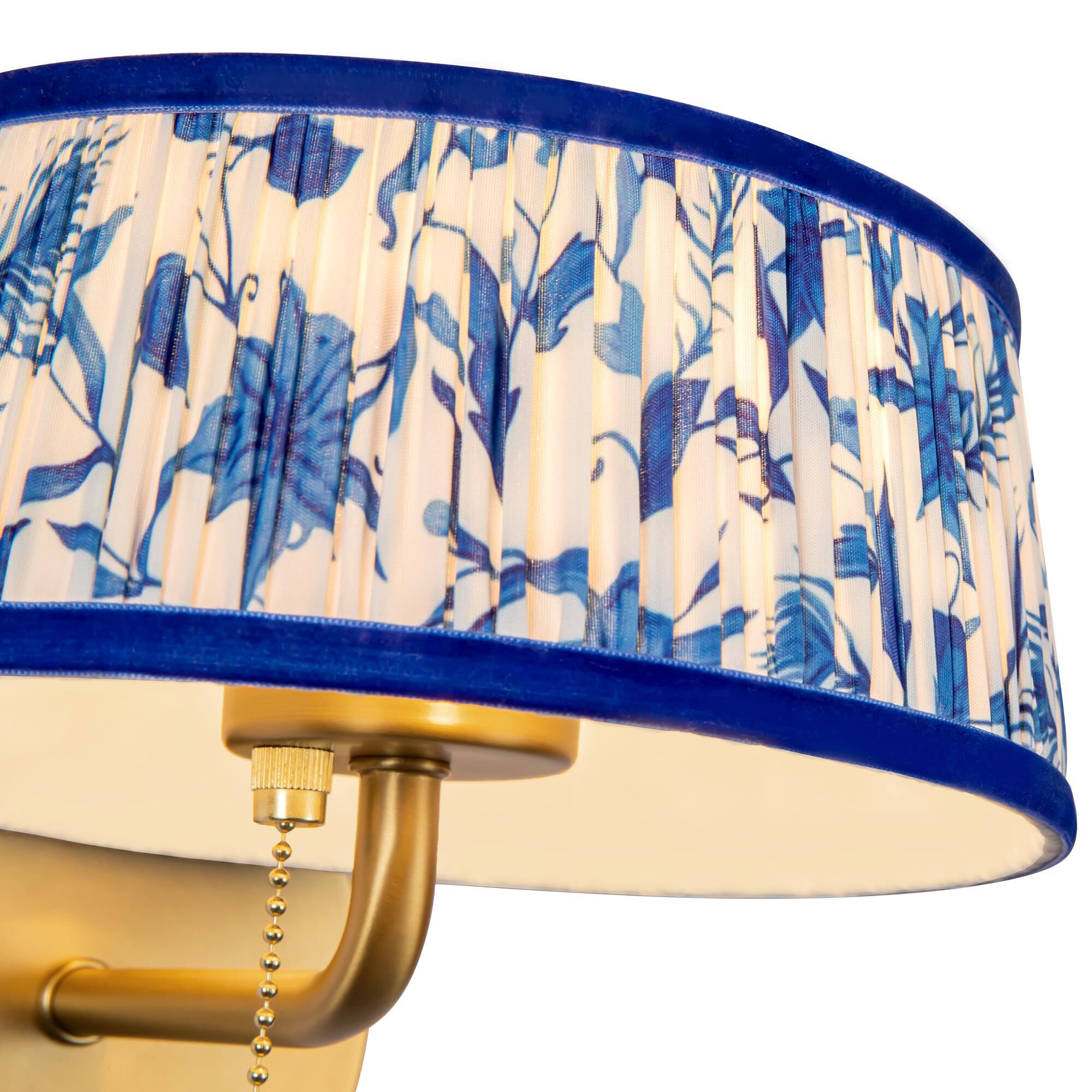 Shown in Brushed Gold finish and Blue Linen shade