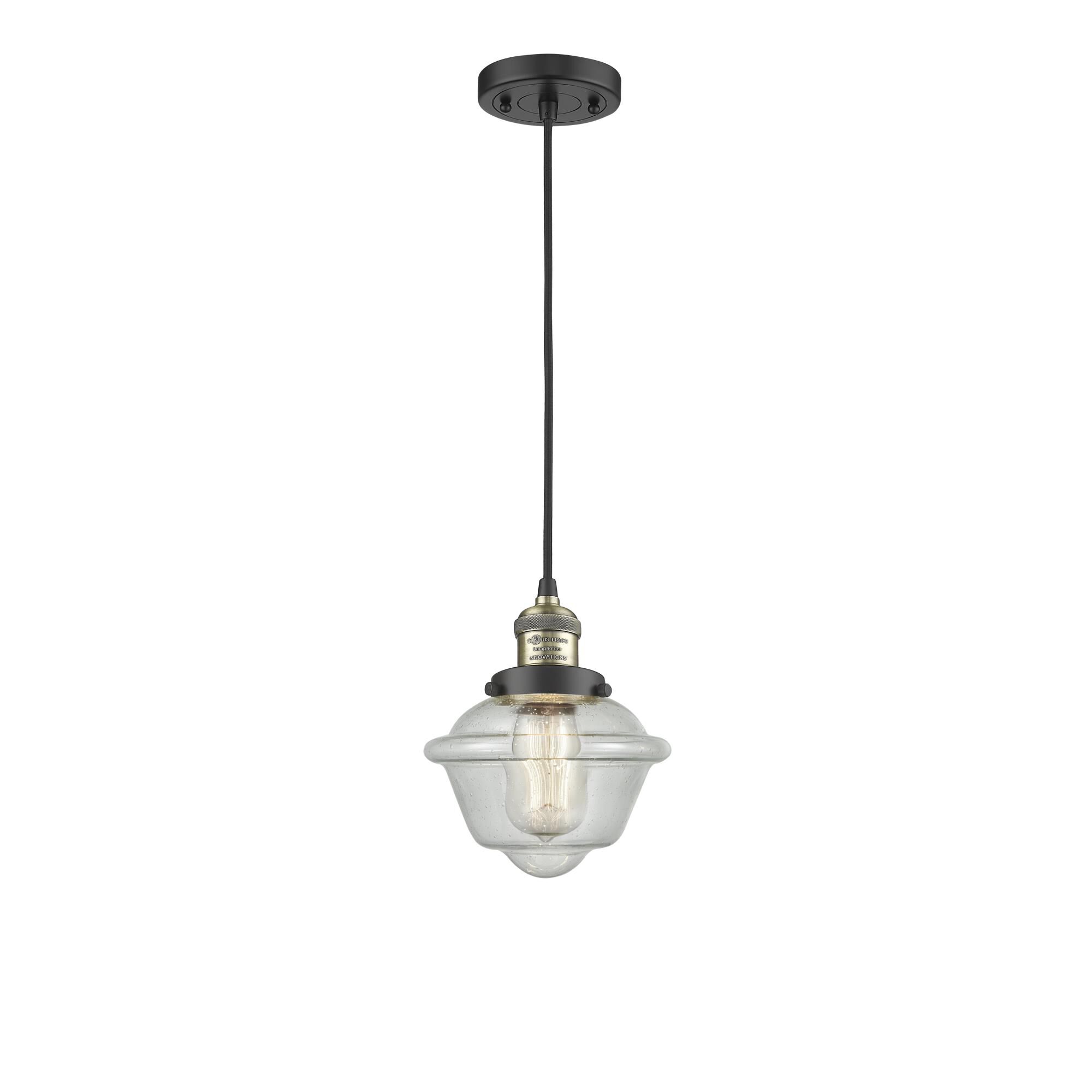 Shown in Black Antique Brass finish and Seedy glass