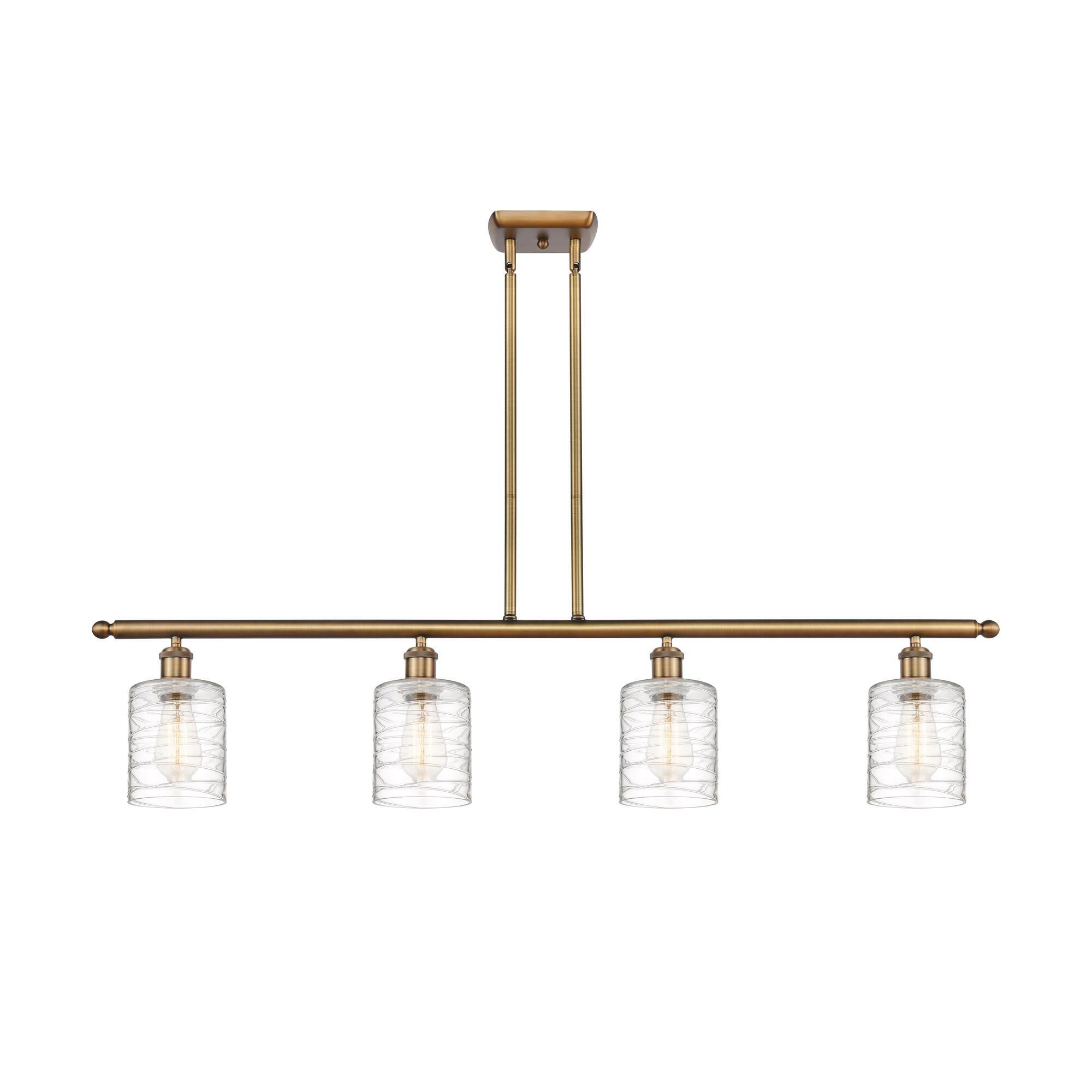 Shown in Brushed Brass finish and Deco Swirl Cobbleskill glass