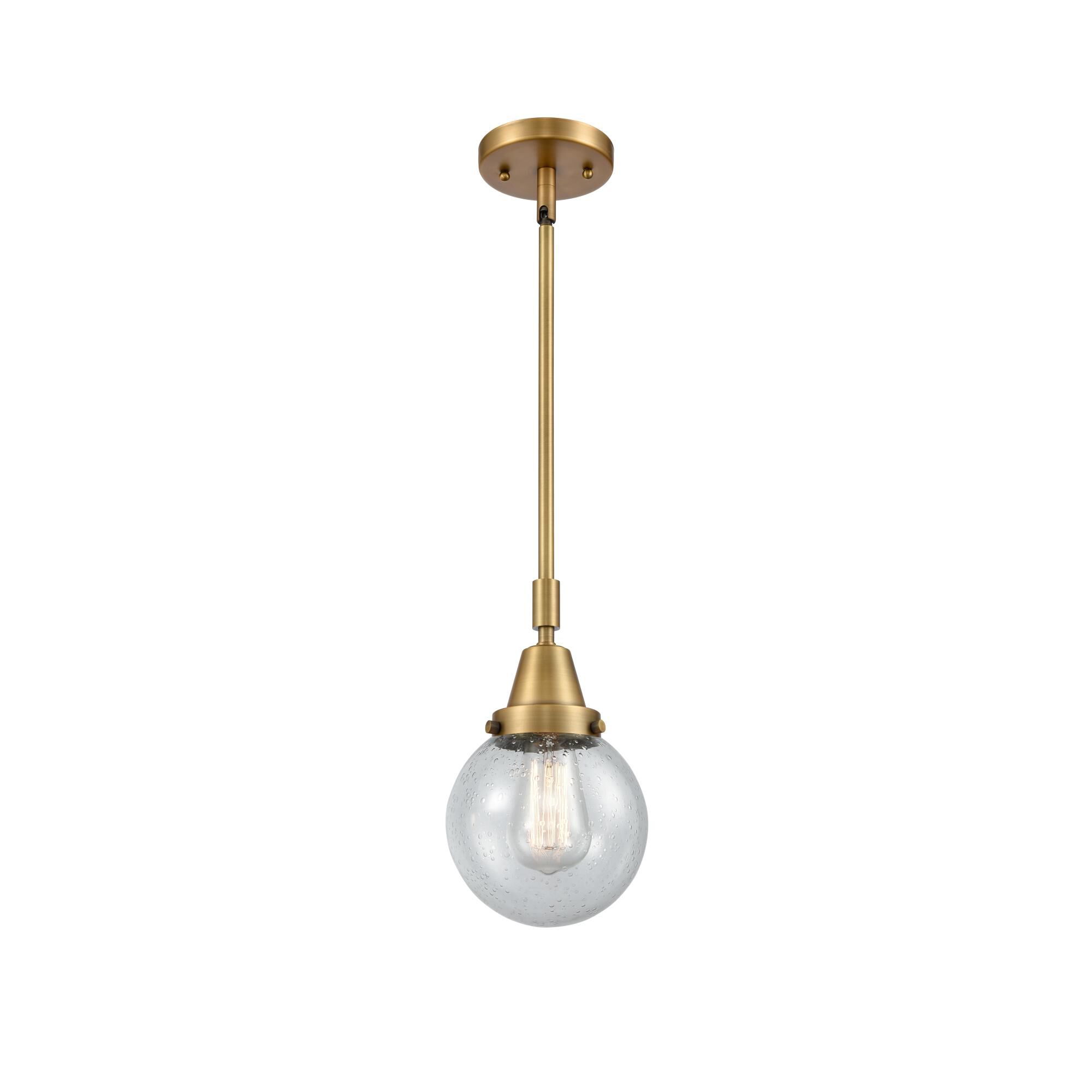 Shown in Brushed Brass finish and Seedy Beacon glass