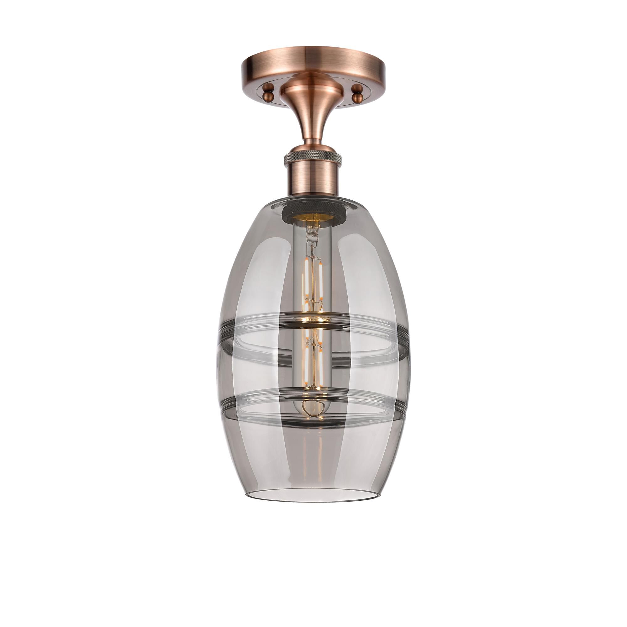 Shown in Antique Copper finish and Light Smoke glass
