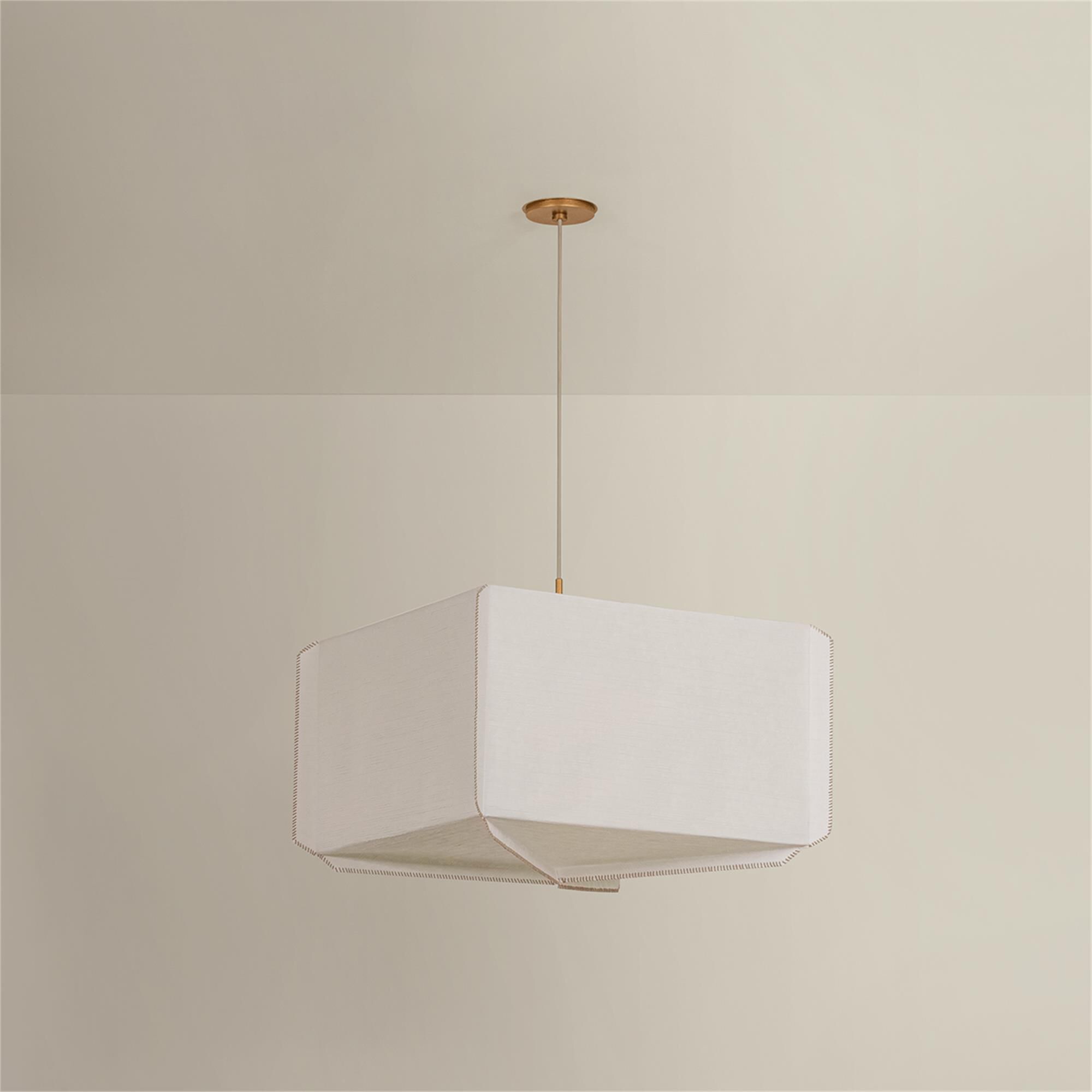 Shown in Patina Gold Leaf finish and Handmade Paper shade