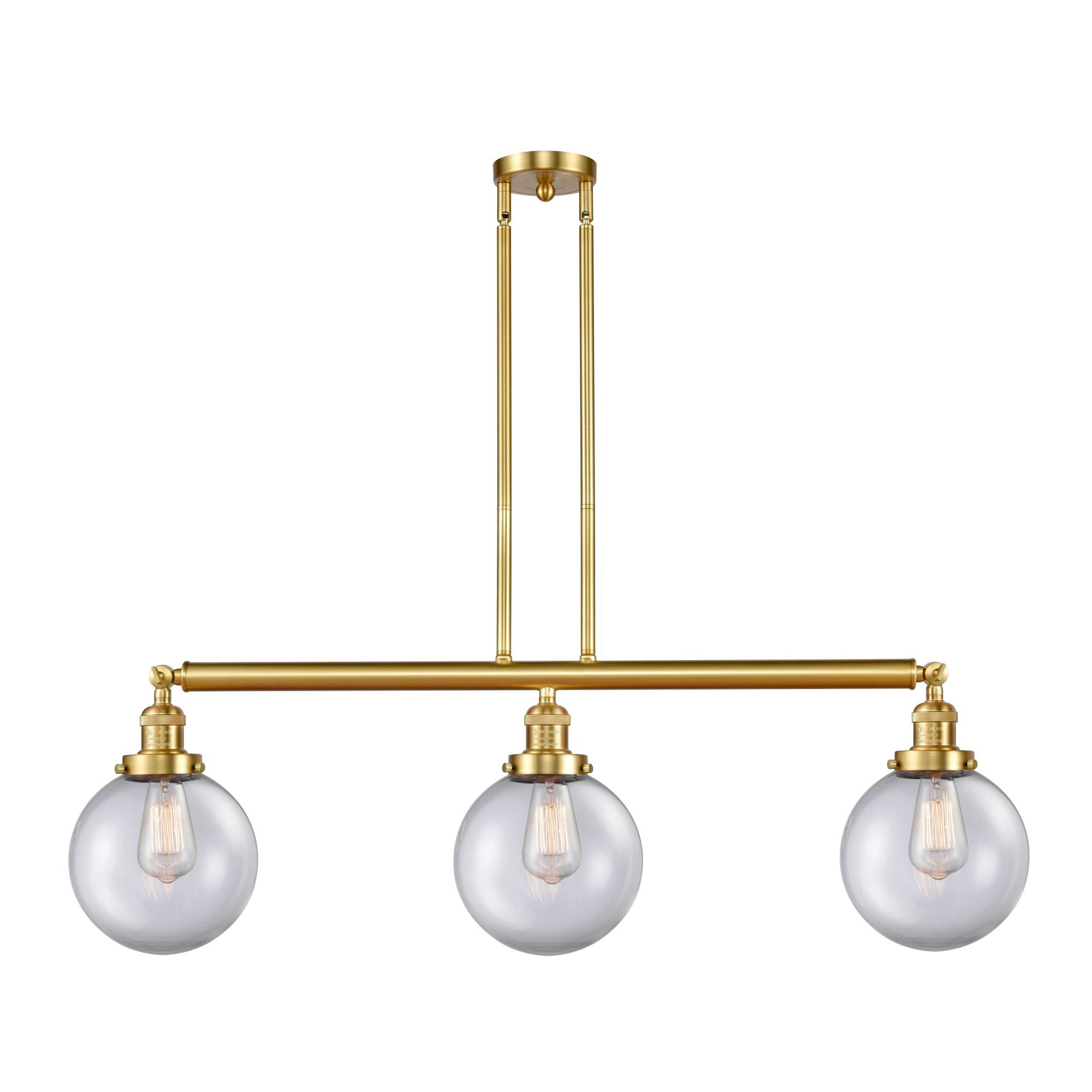 Shown in Satin Gold finish and Clear Beacon glass