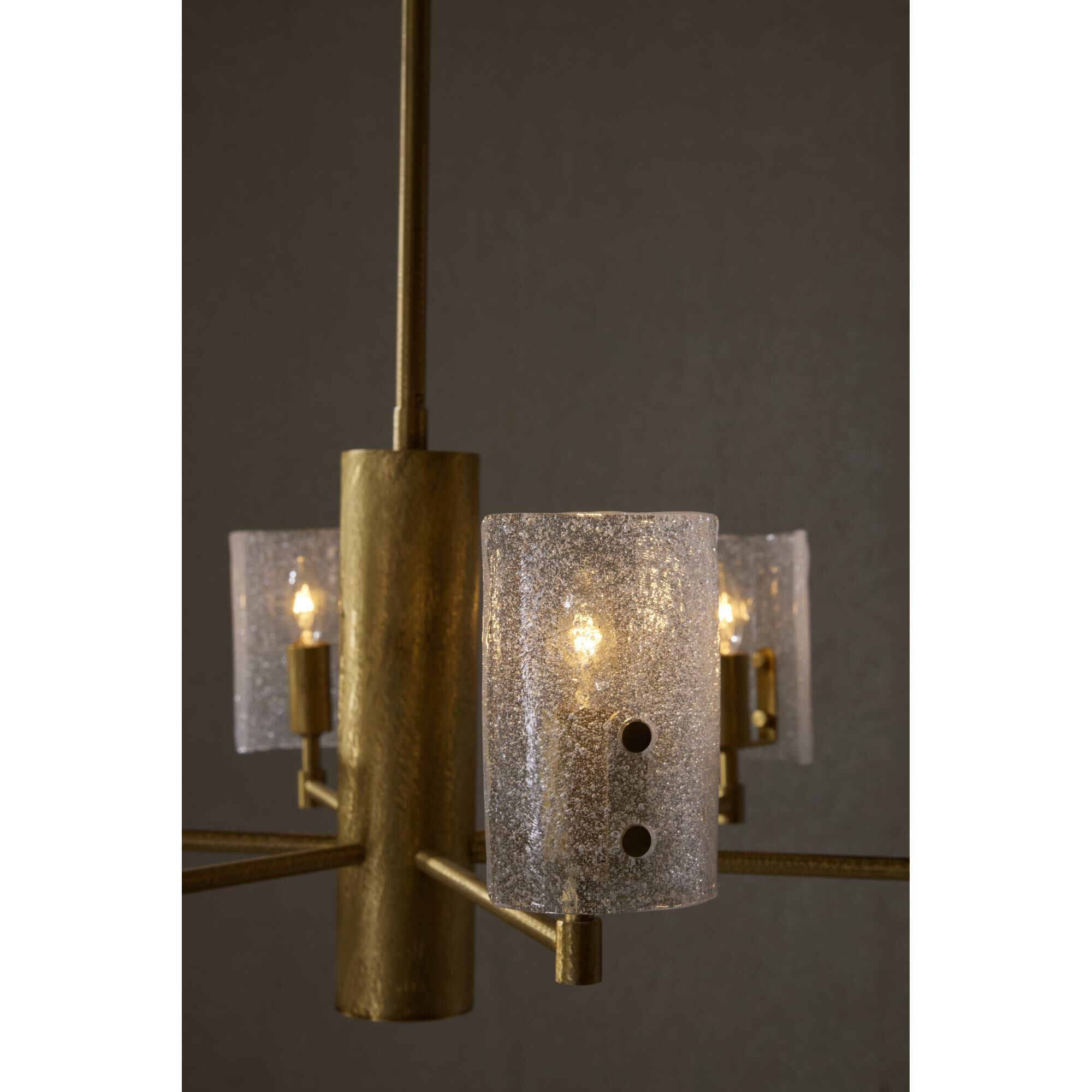 Shown in Antique Brass finish and Clear Seedy Slump glass