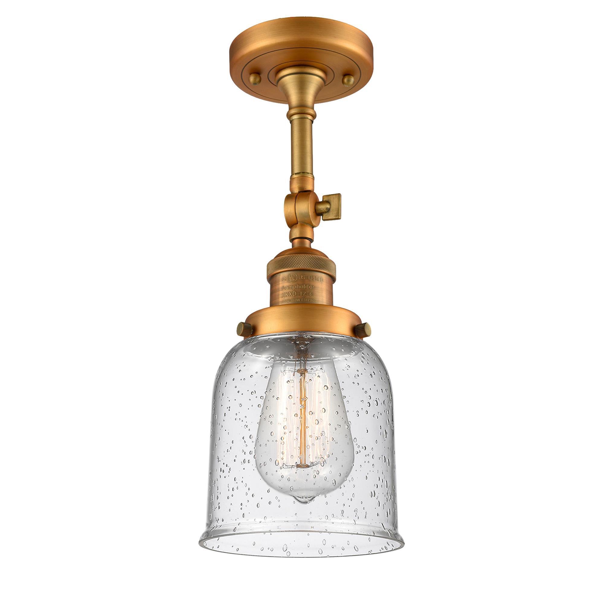 Shown in Brushed Brass finish and Seedy glass