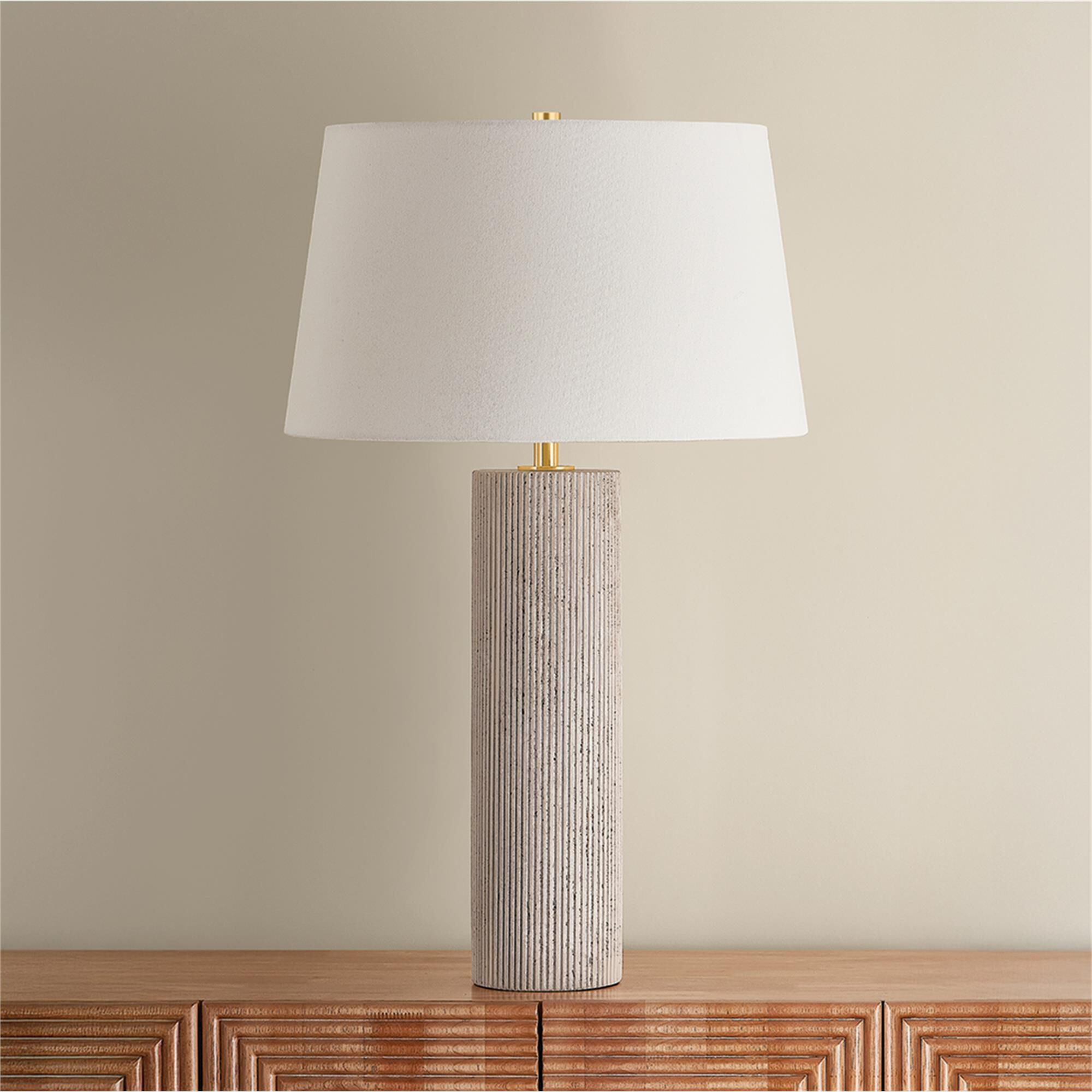 Shown in Aged Brass finish and Off White Linen shade