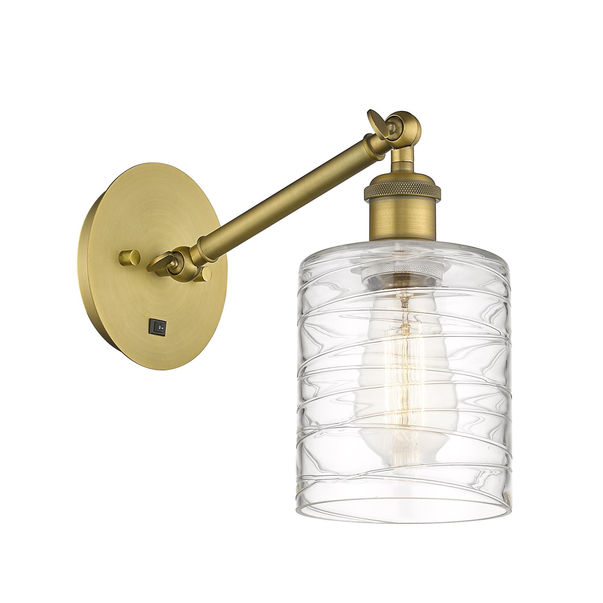 Shown in Brushed Brass finish and Deco Swirl Cobbleskill glass