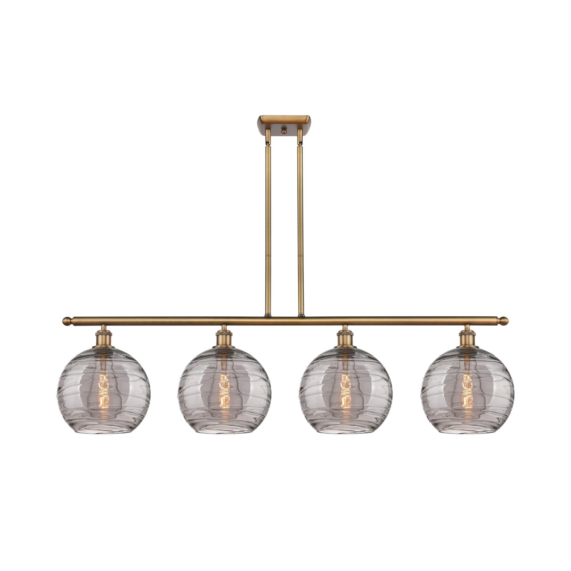 Shown in Brushed Brass finish and Light Smoke Deco Swirl glass