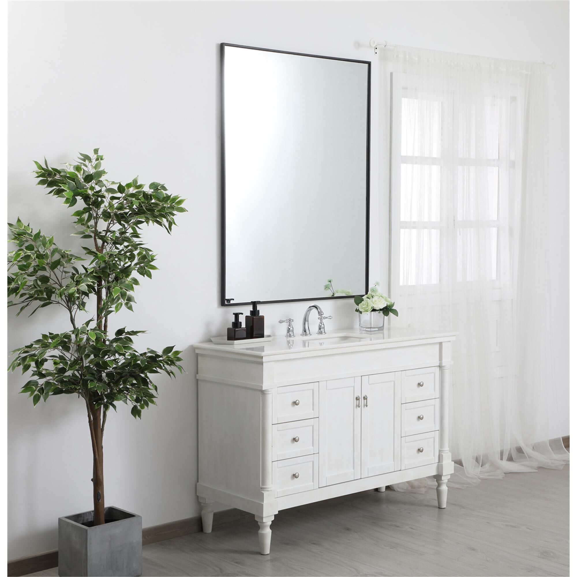 Shown in Silver finish and Clear Mirror Beveled glass