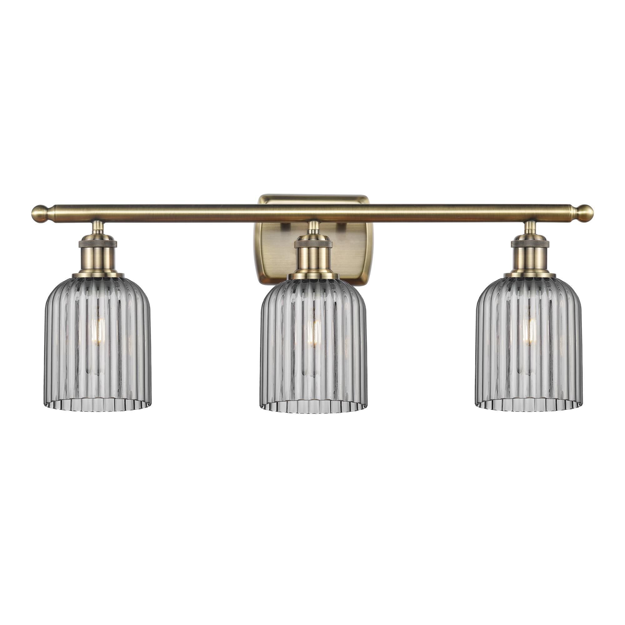 Shown in Antique Brass finish and Light Smoke shade