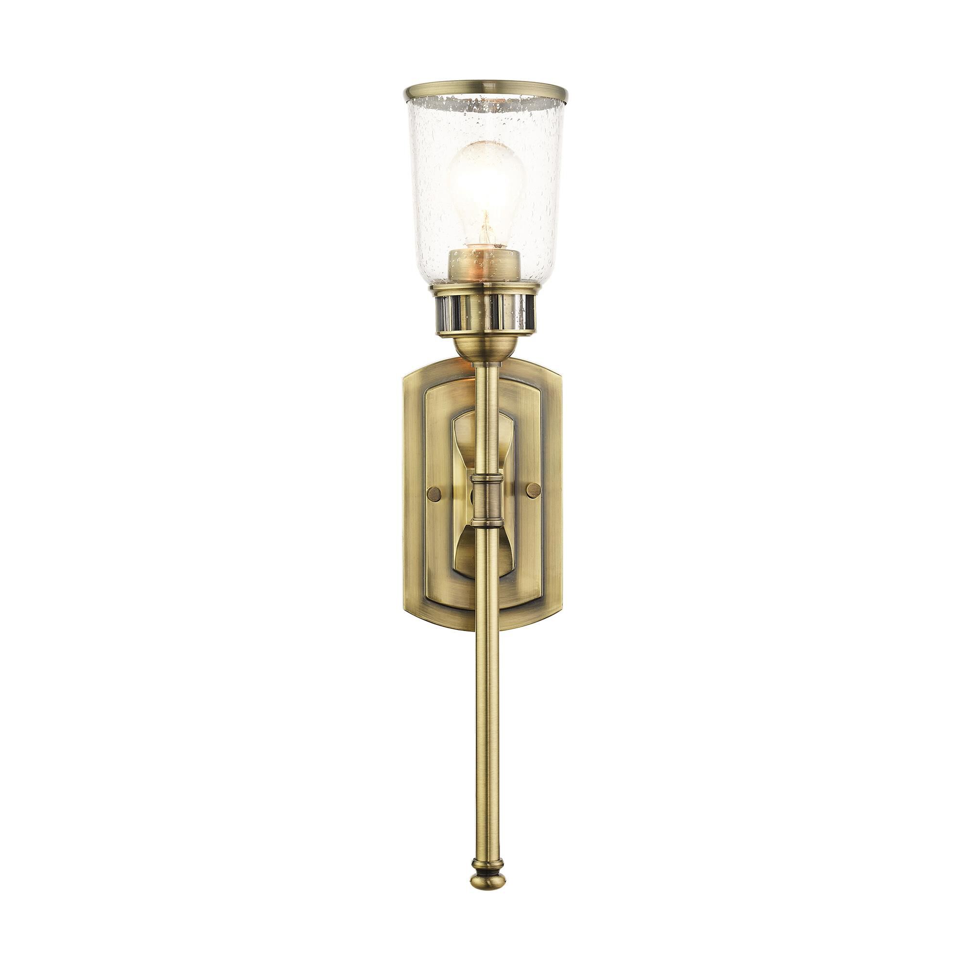 Shown in Antique Brass finish and Hand Blown Clear Seeded glass and Hand Blown Clear Seeded Glass shade