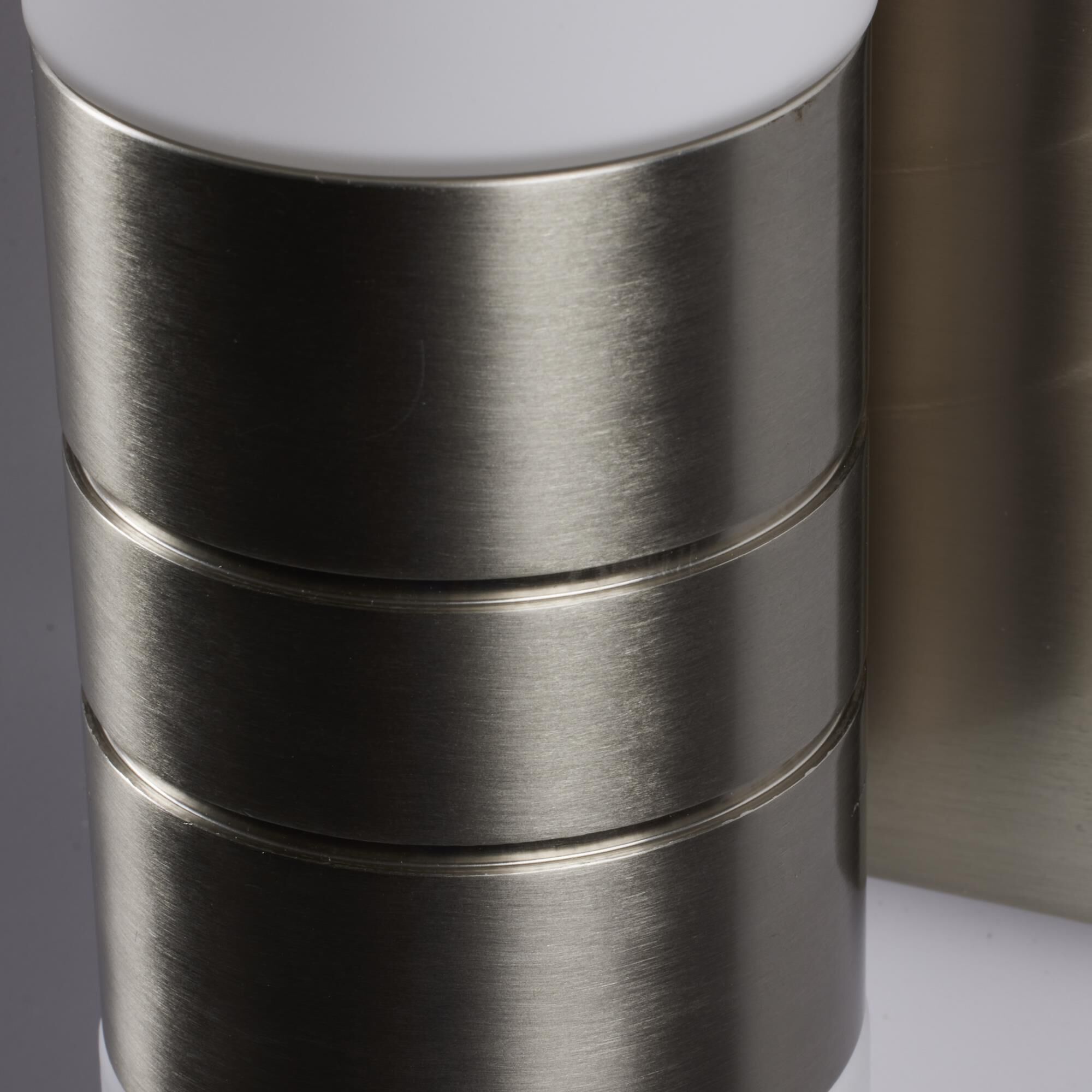 Shown in Brushed Nickel finish and White glass